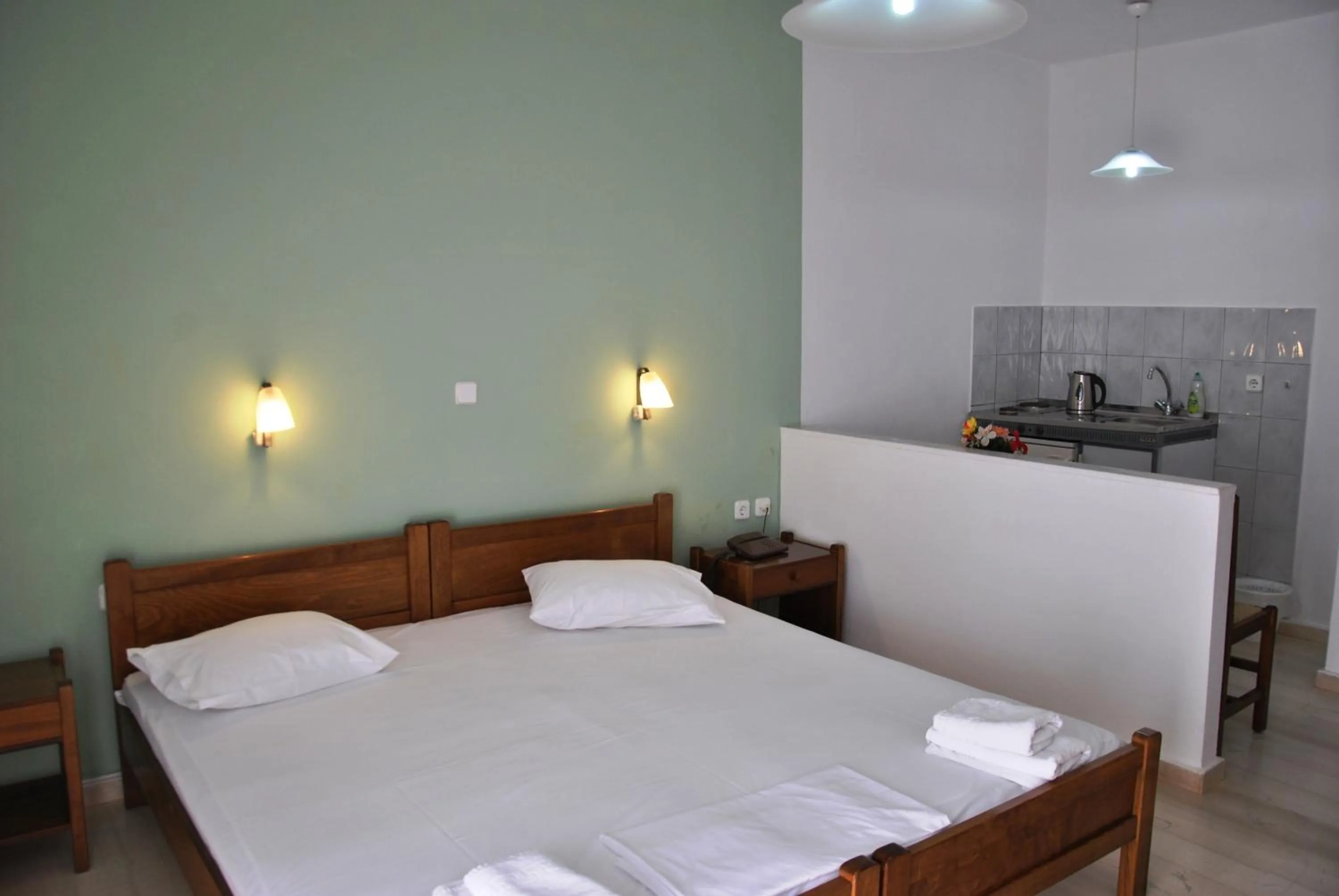 Bed in Filoxenia Hotel & Apartments