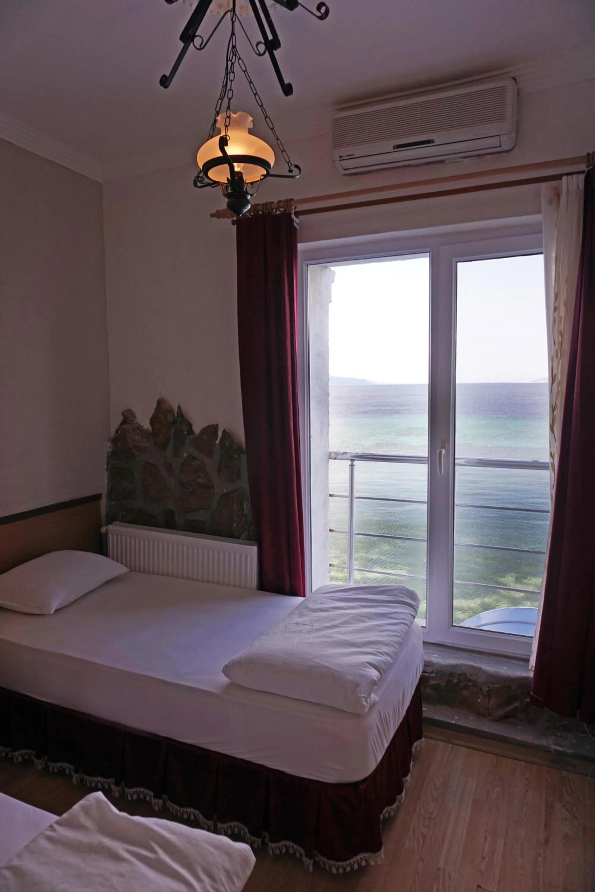 Seating area in Aqua Boss Hotel