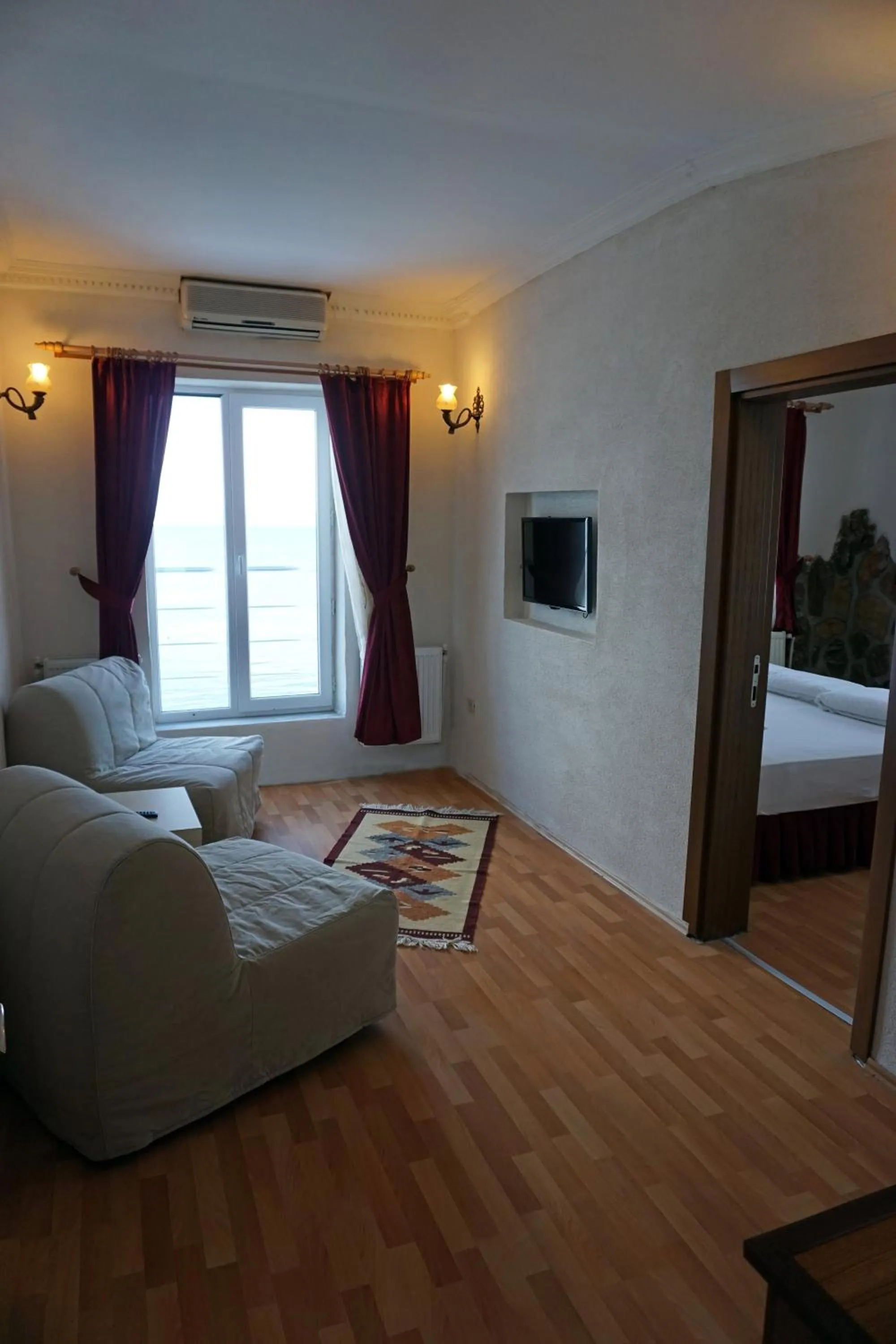 Toilet in Aqua Boss Hotel