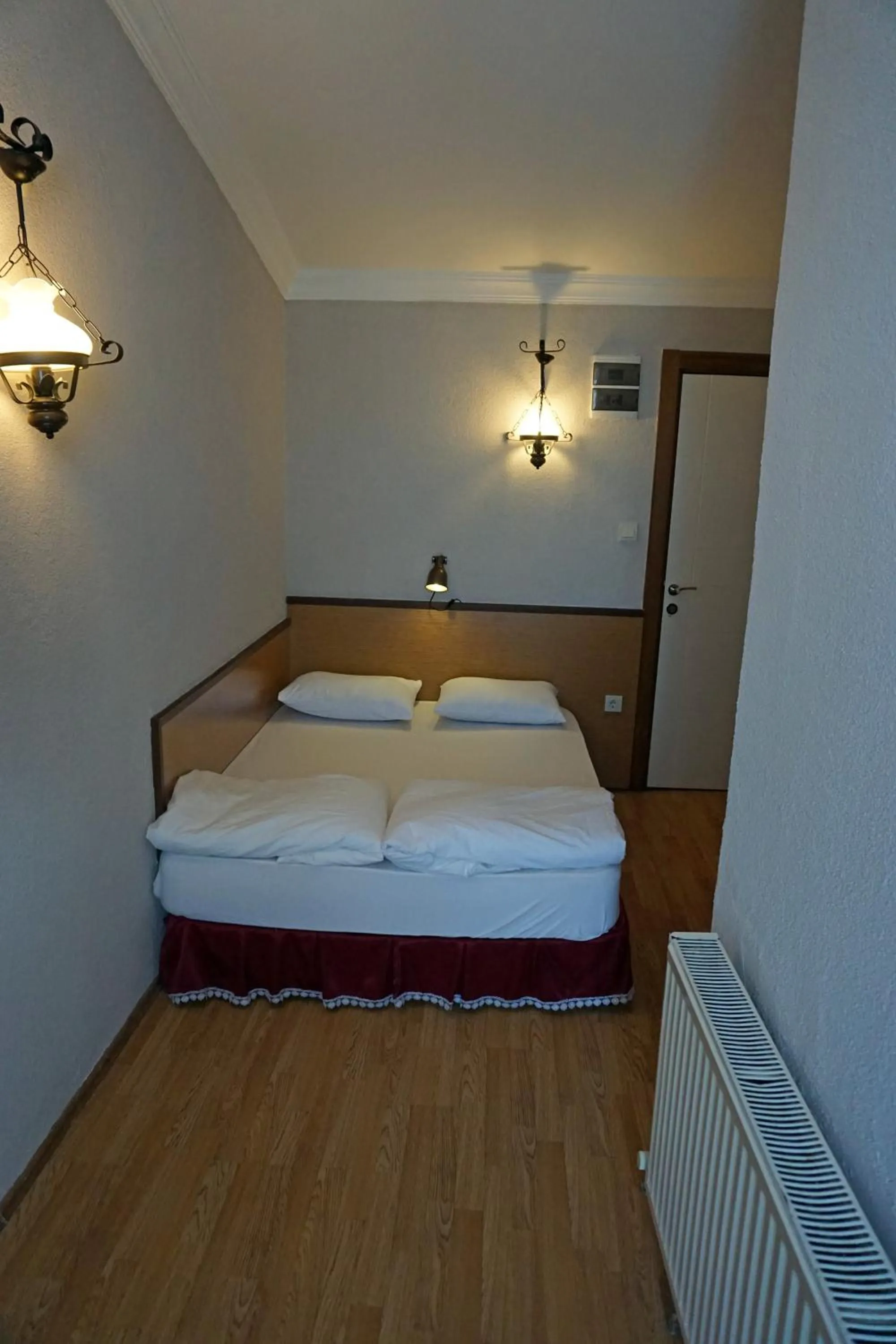 Bedroom in Aqua Boss Hotel