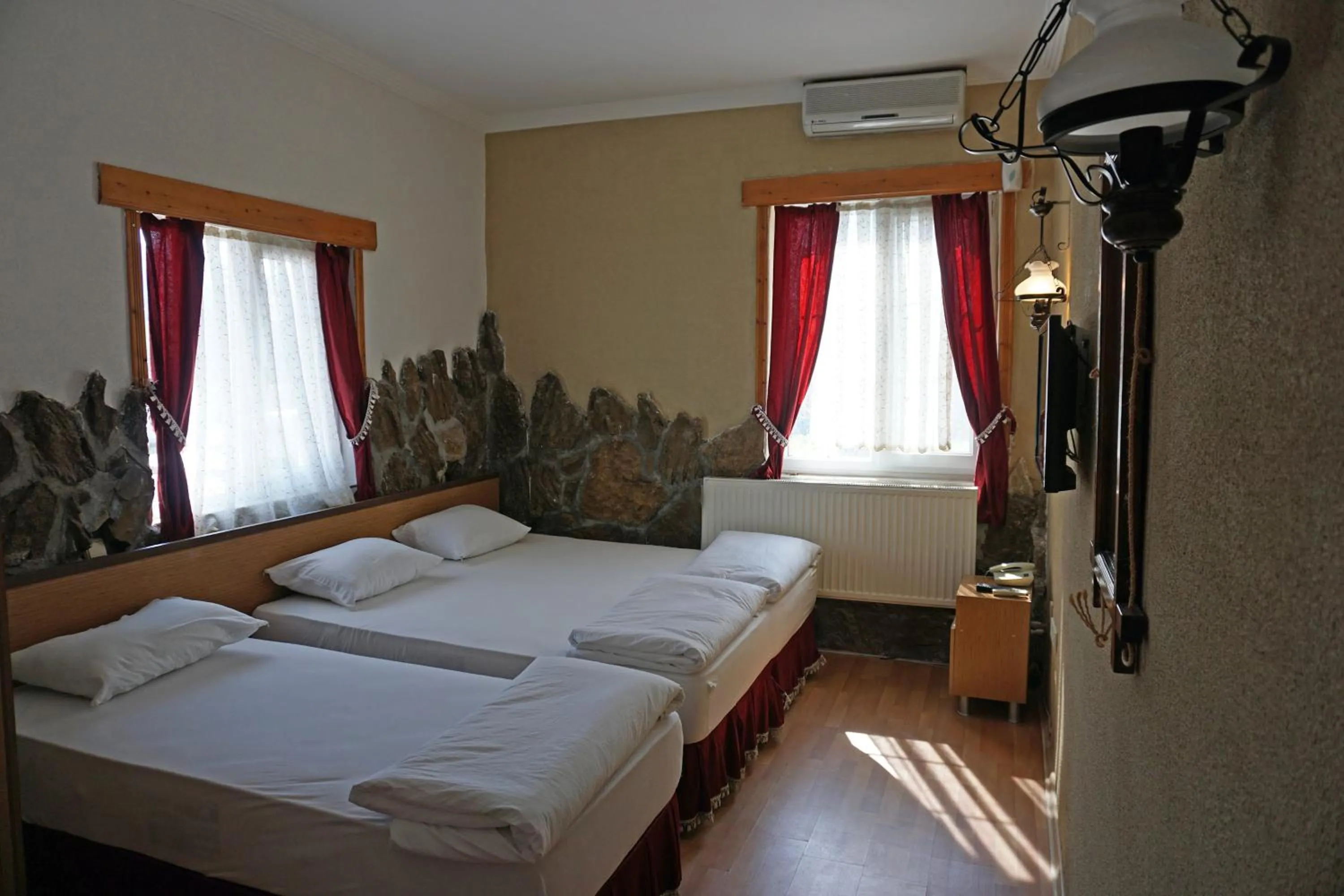 Bedroom in Aqua Boss Hotel