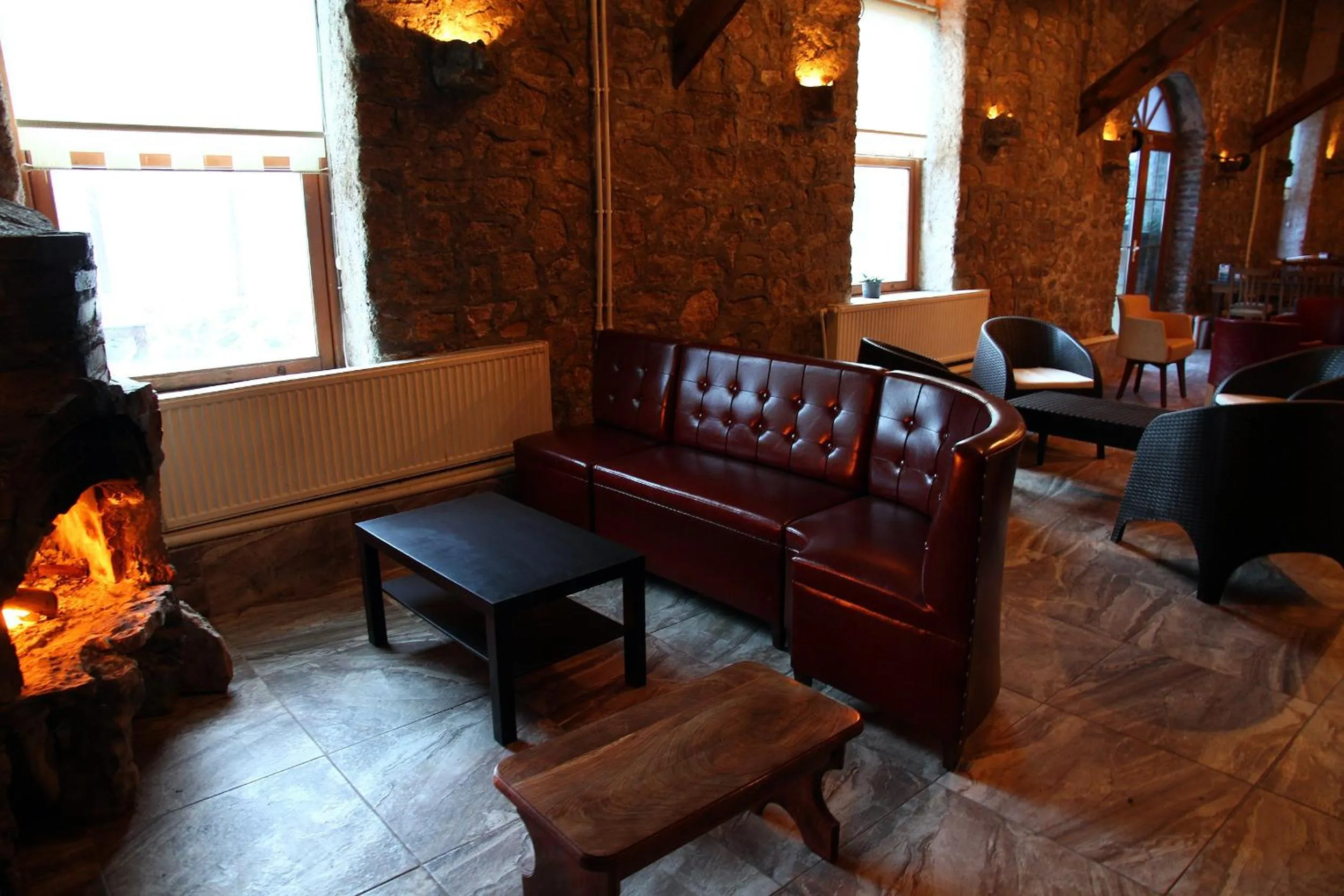 Communal lounge/ TV room in Aqua Boss Hotel