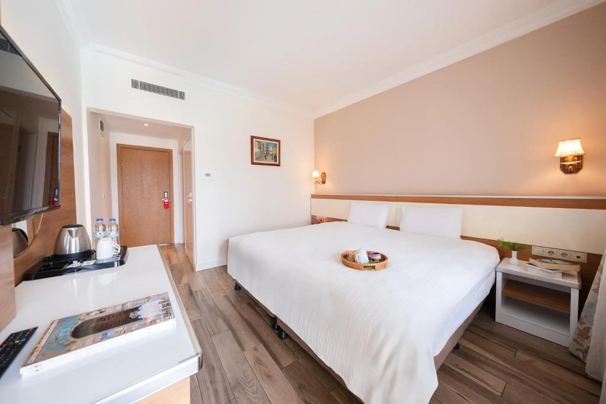 Bed in Iris Hotel & Spa