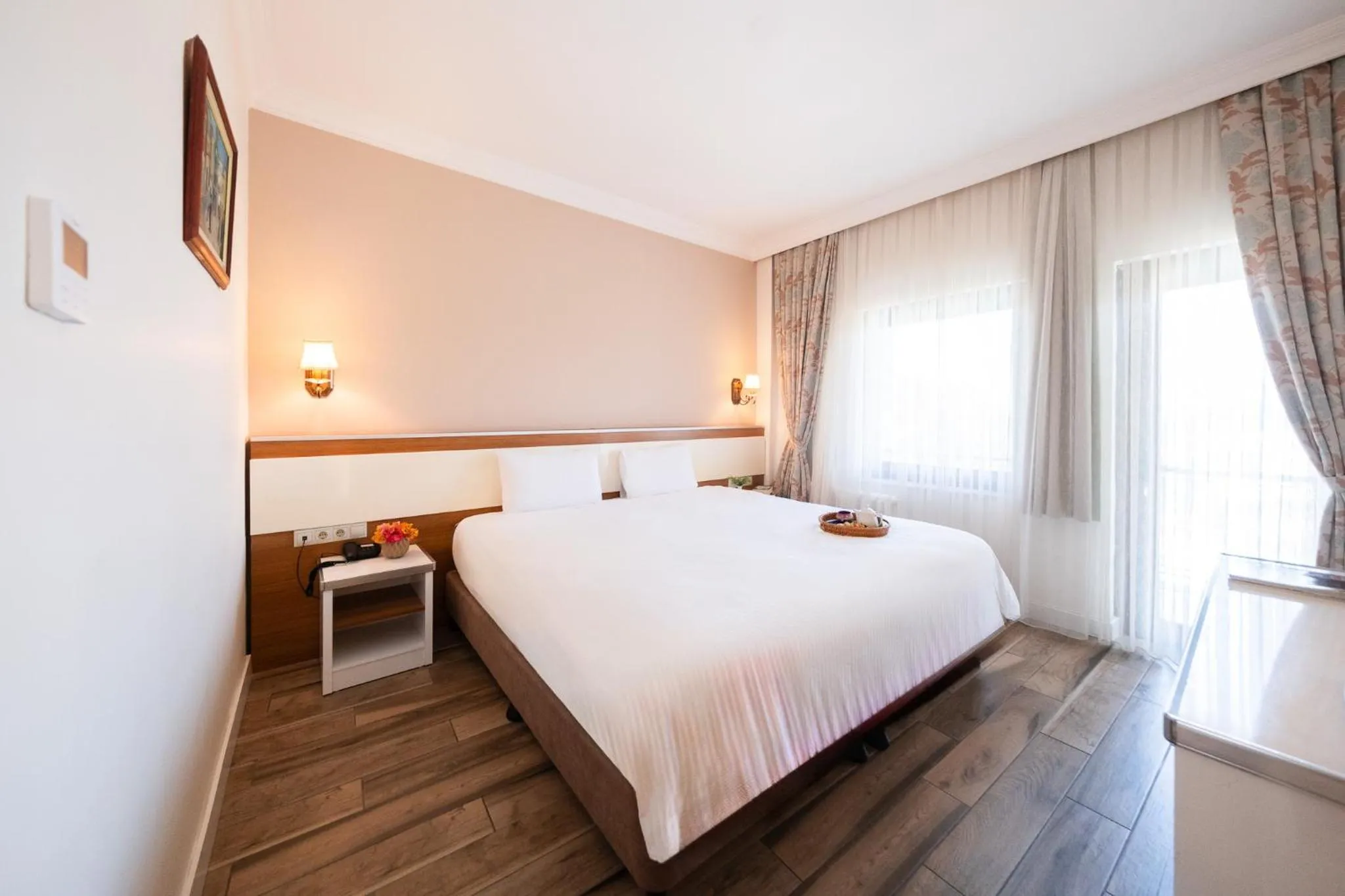 Bed in Iris Hotel & Spa