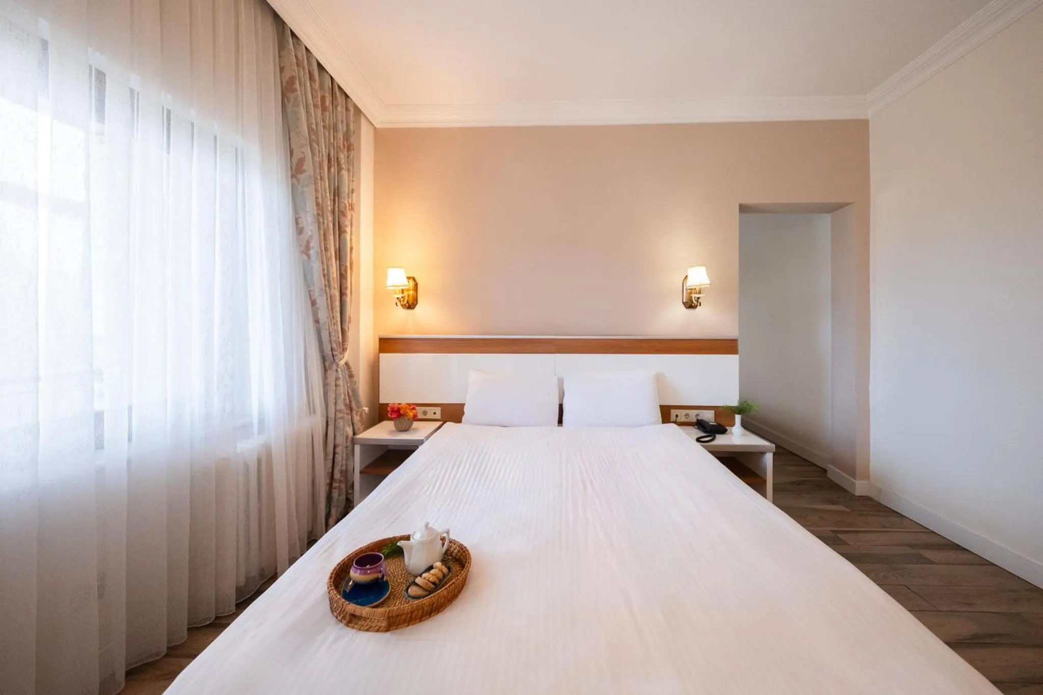 Bed in Iris Hotel & Spa