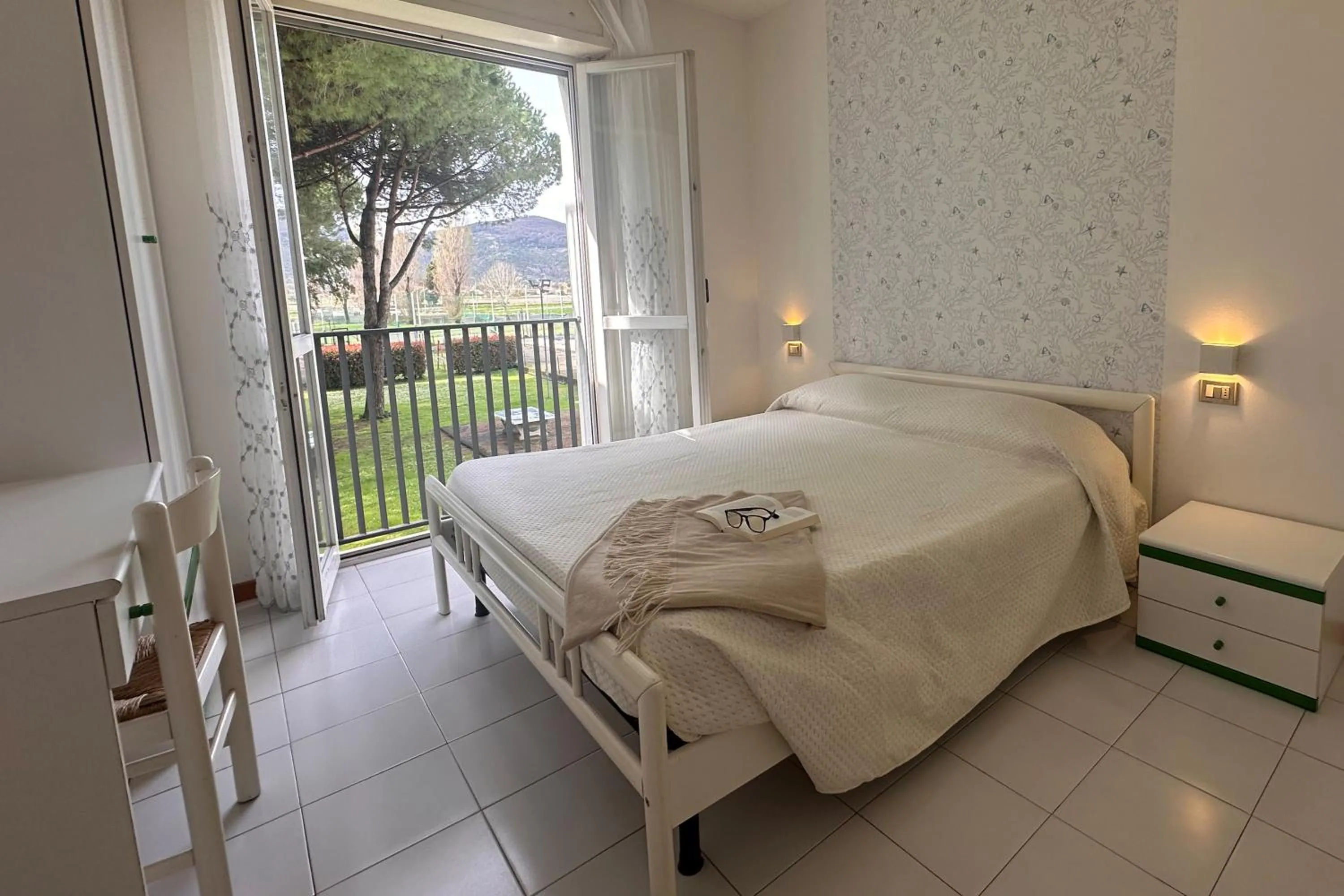 Bed in Residenza Alberghiera Italia