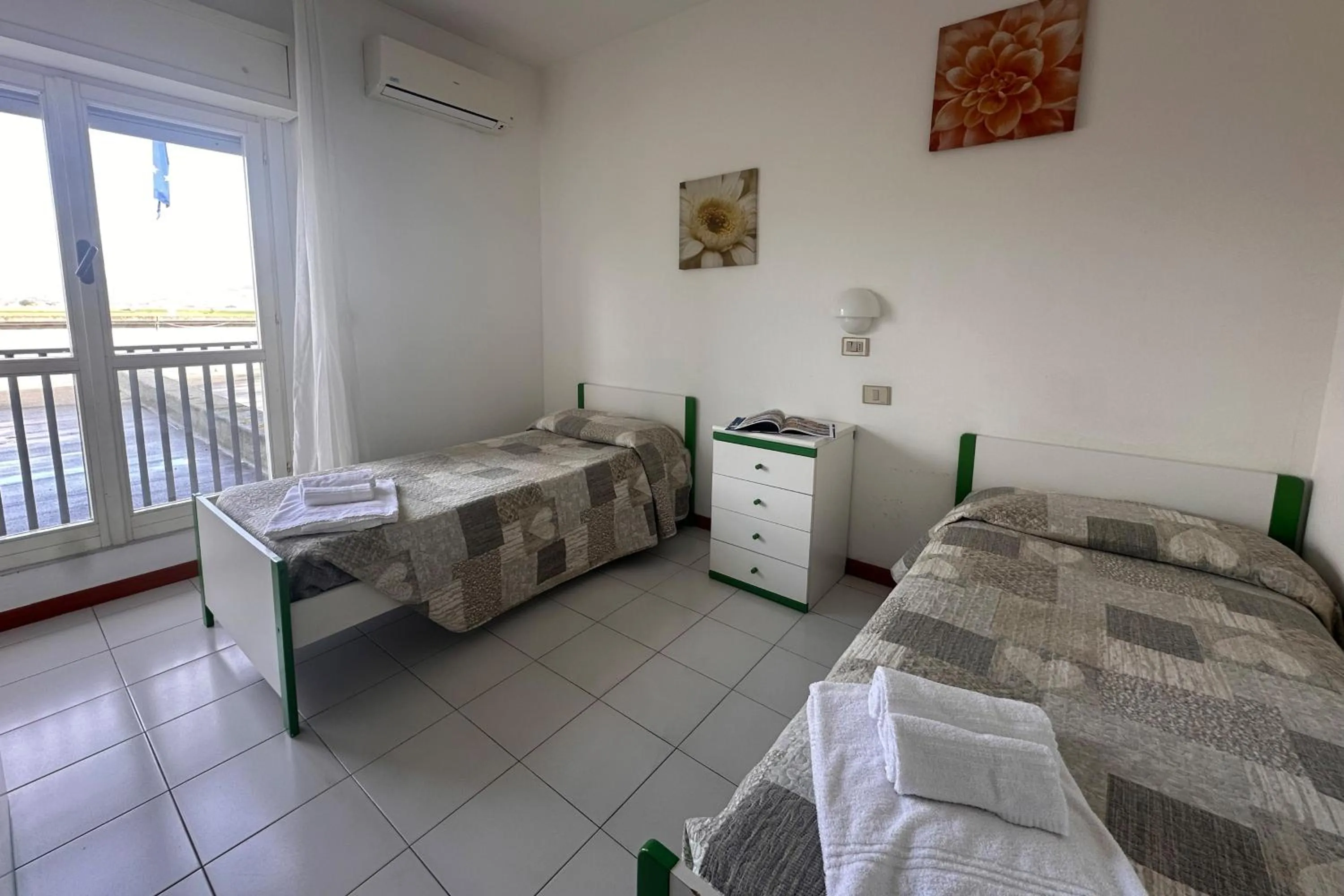 Bed in Residenza Alberghiera Italia