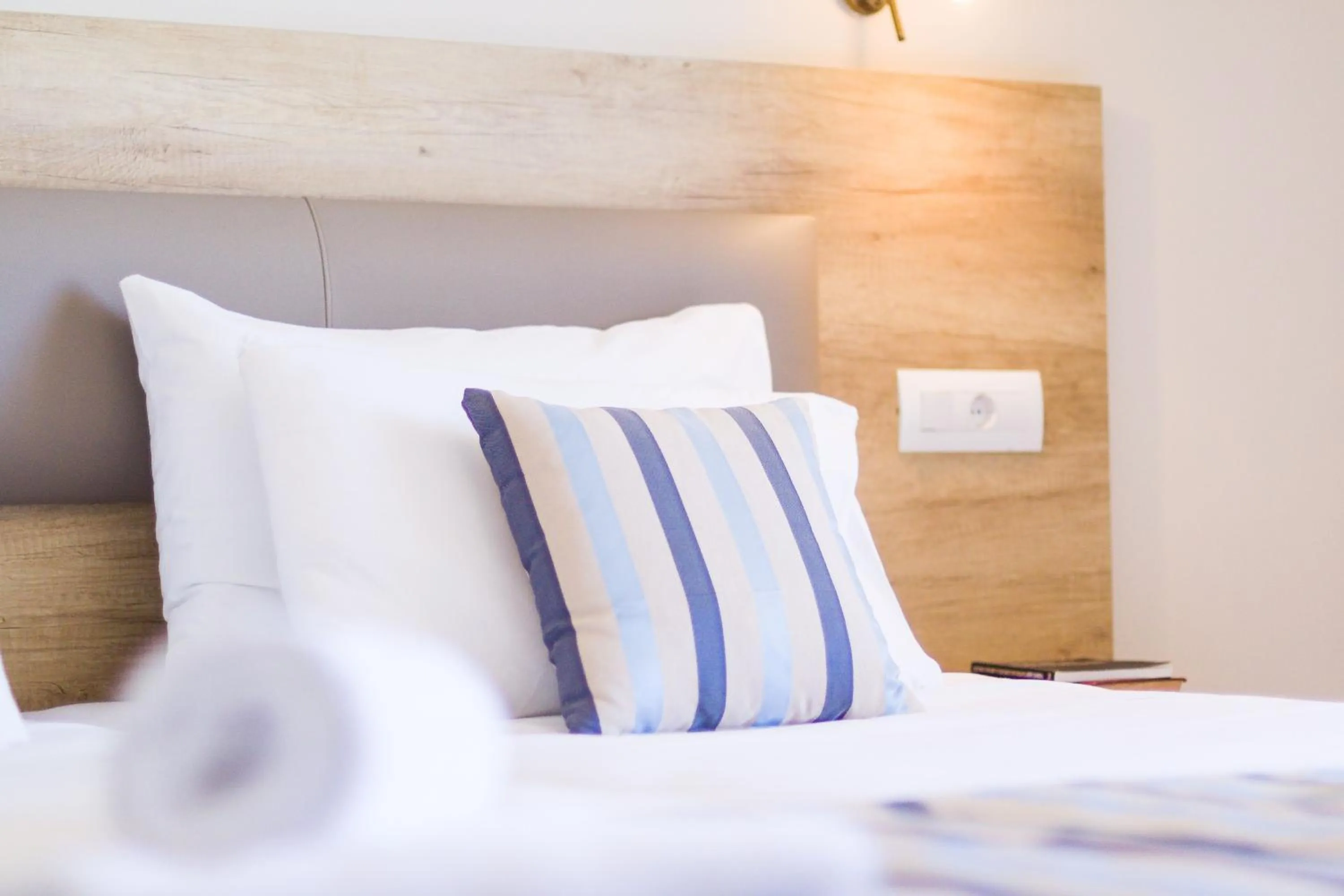 Bed in Theo Star Beach Hotel