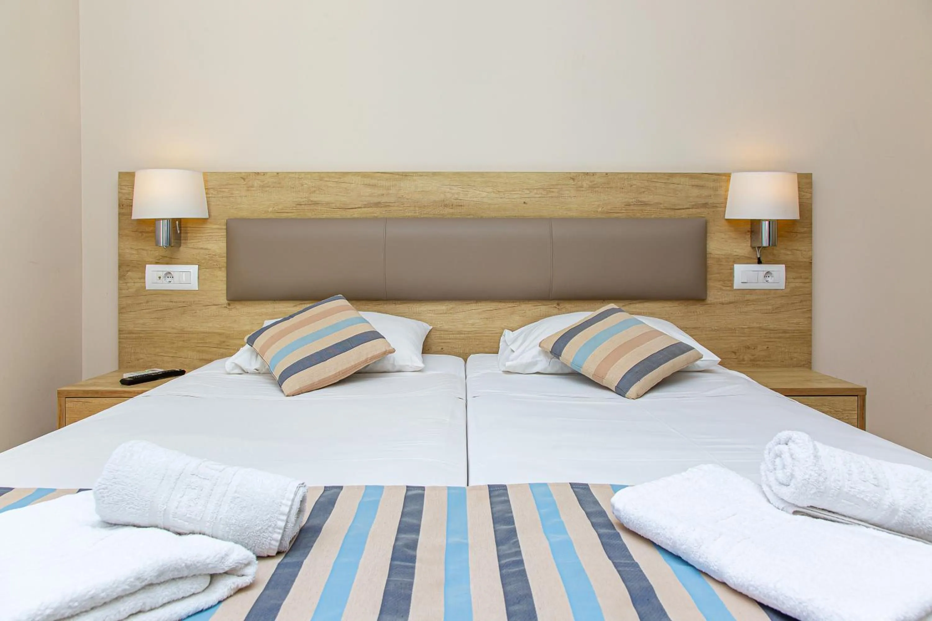 Bed in Theo Star Beach Hotel