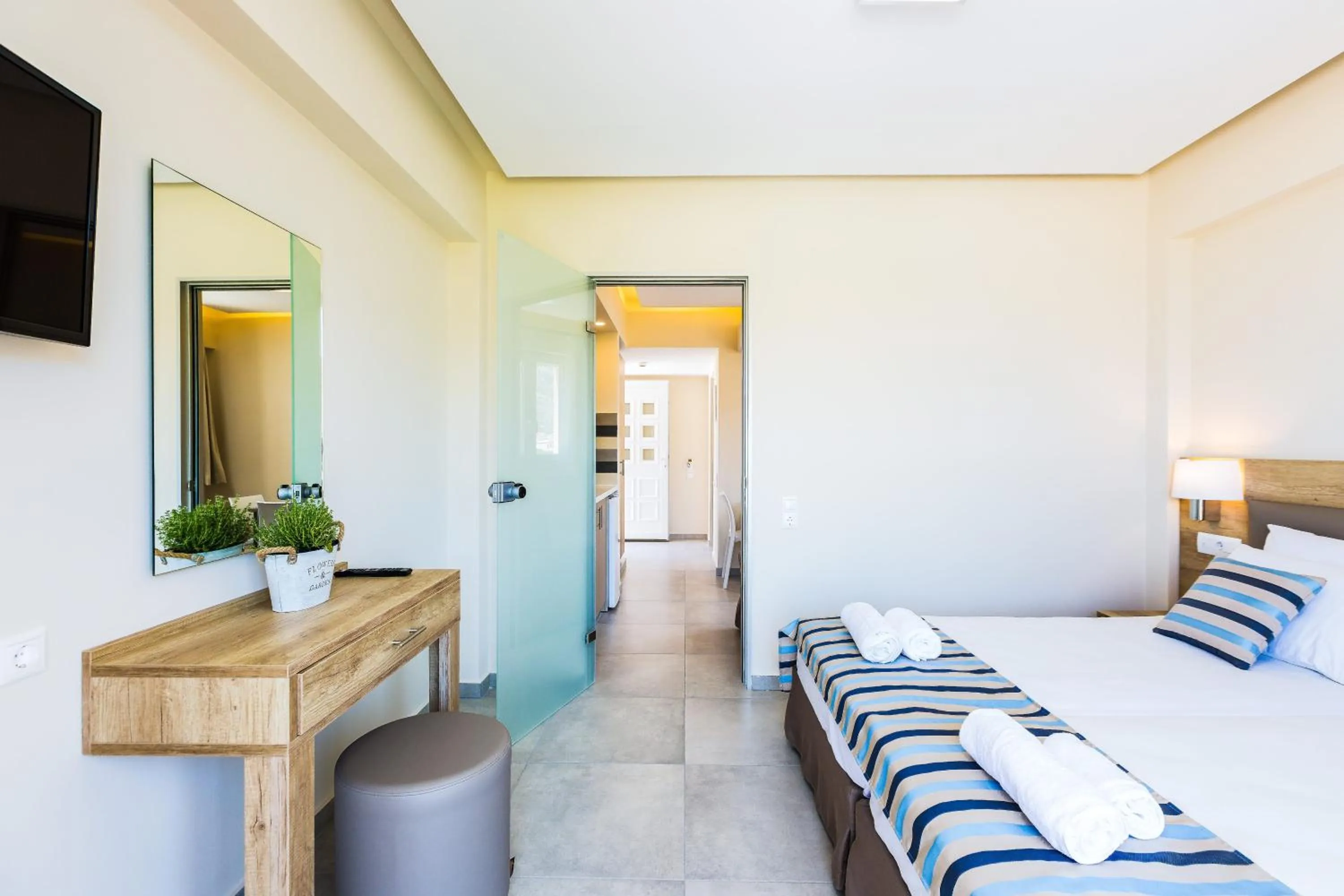 Bed in Theo Star Beach Hotel