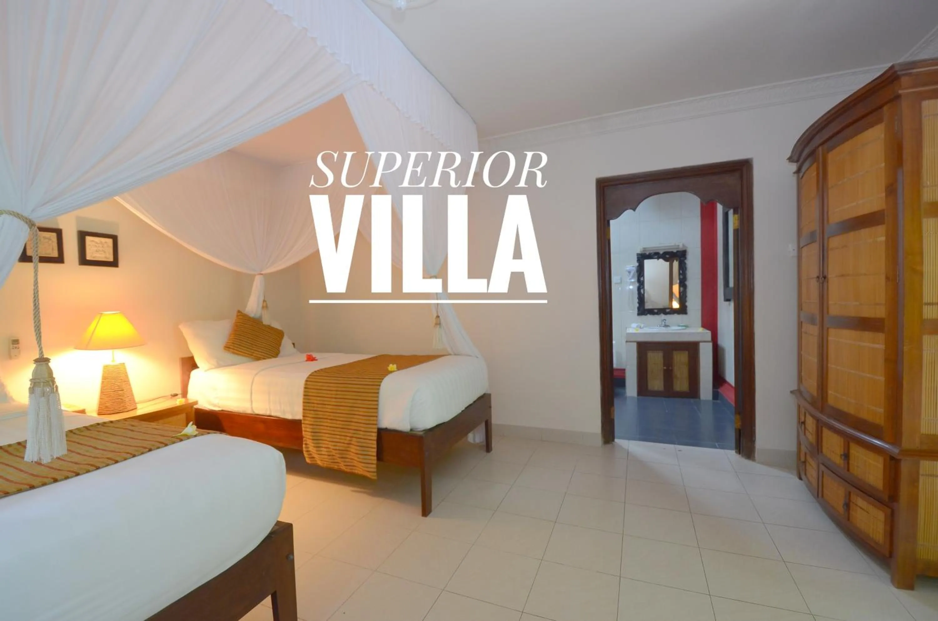 Photo of the whole room, Bed in Tirta Ayu Hotel and Restaurant