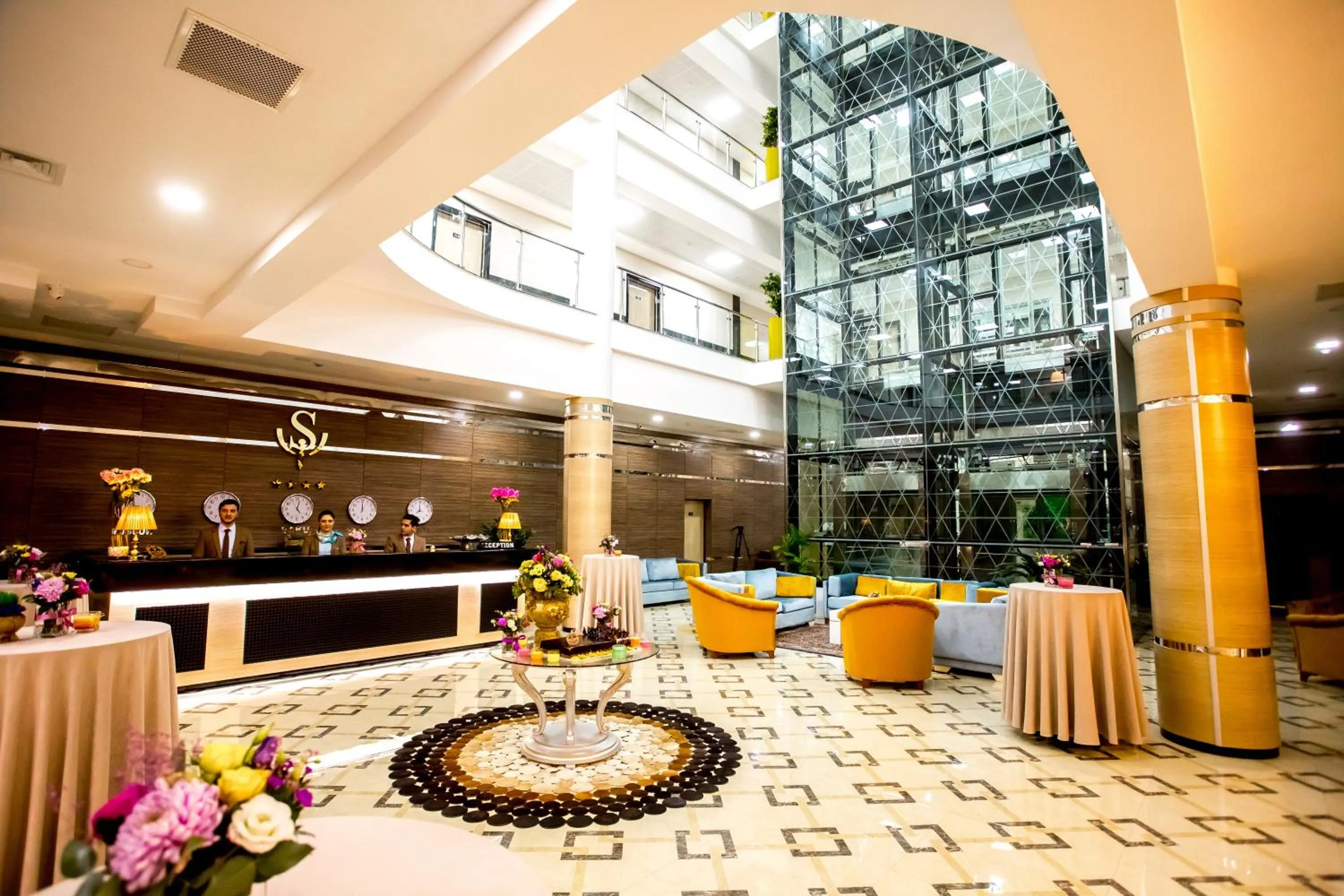 Lobby or reception in West Shine Hotel