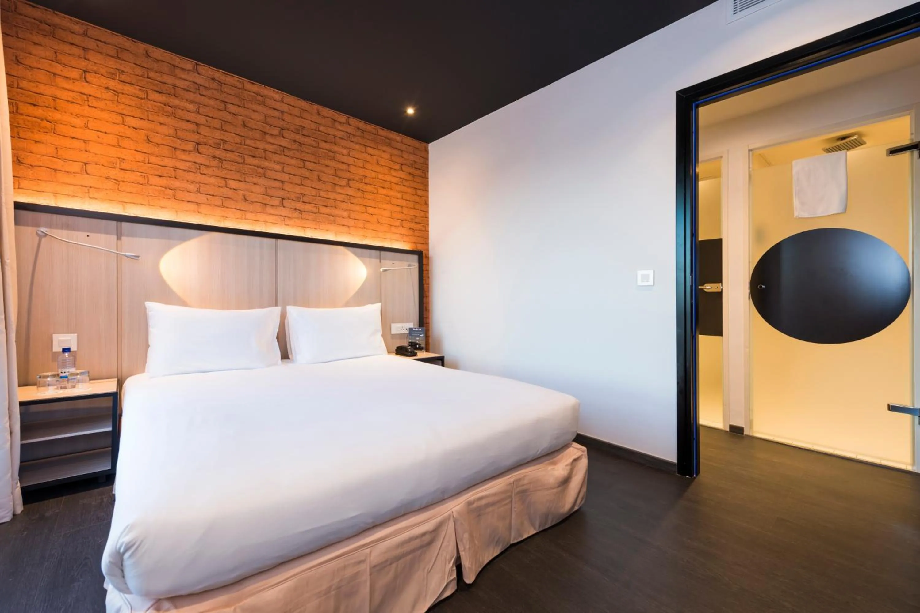 Bedroom, Bed in Onomo Hotel Kigali