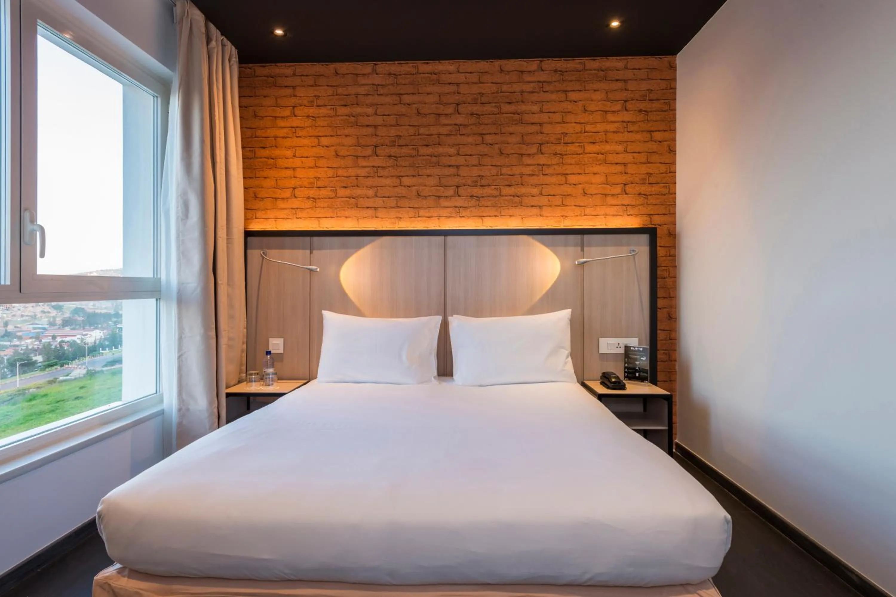 Bedroom, Bed in Onomo Hotel Kigali