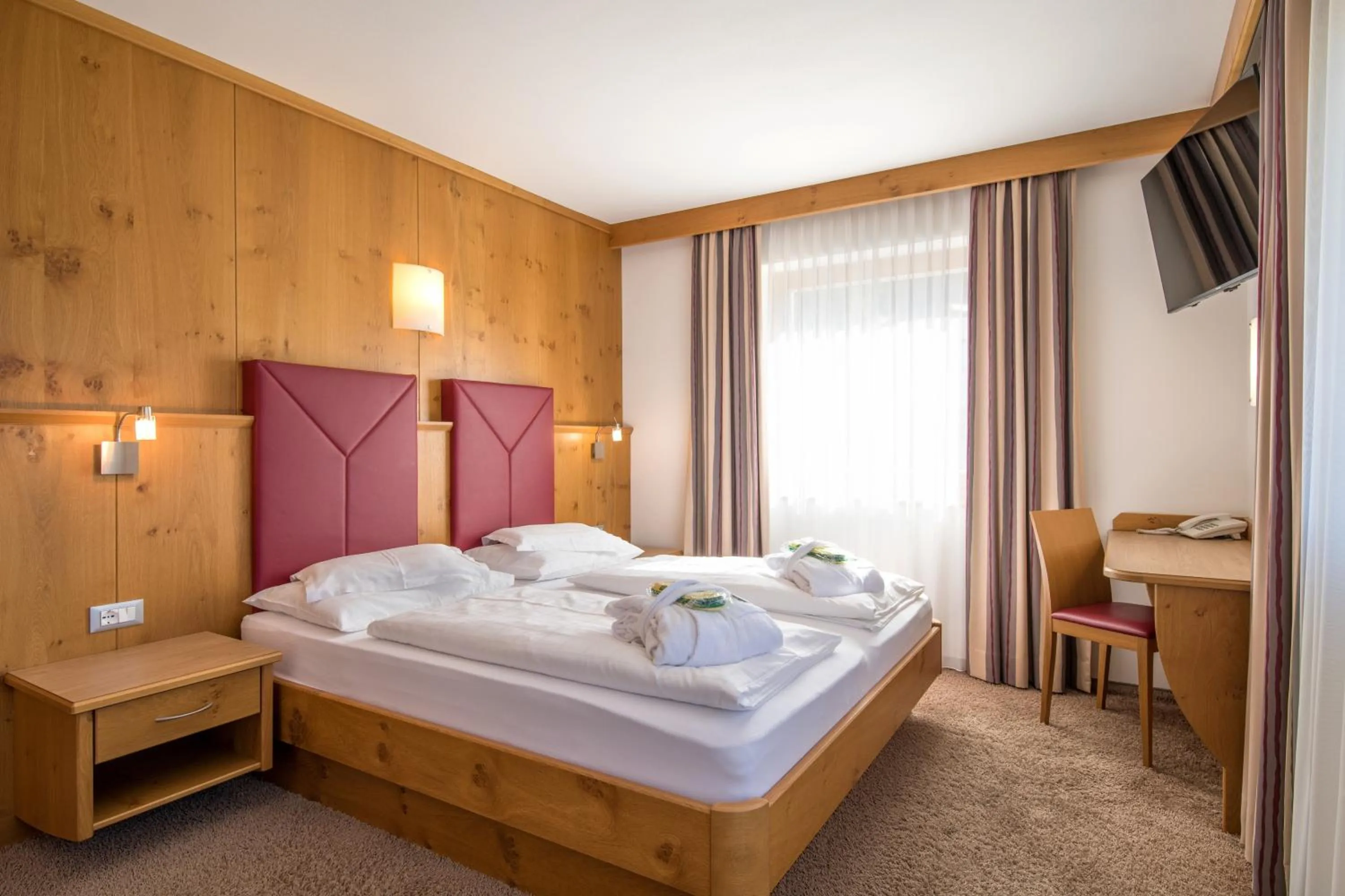 Photo of the whole room, Bed in Garni Hotel Bel Vert