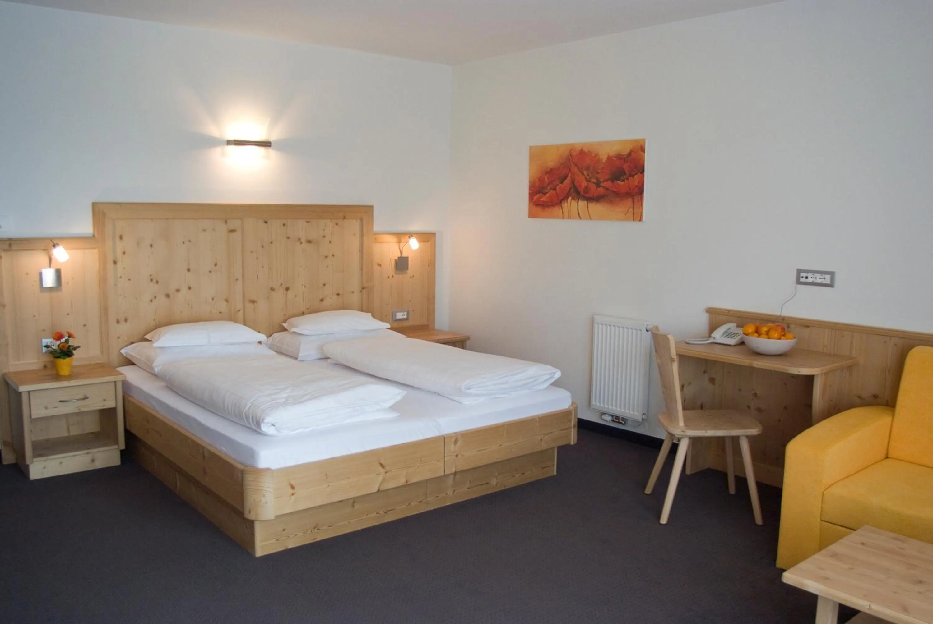 Bed in Garni Hotel Bel Vert