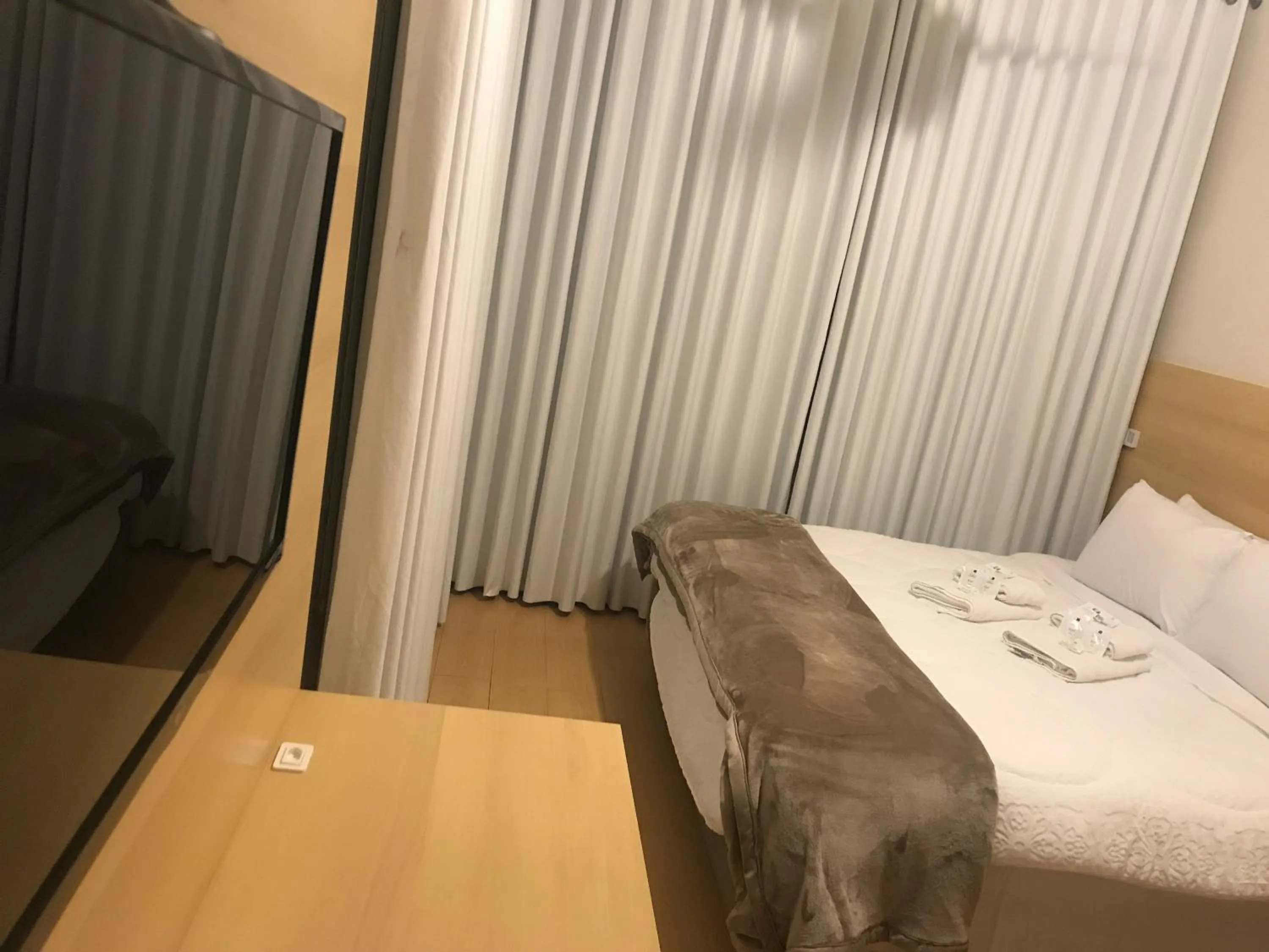 Bed in Hotel Pousada São Lourenço