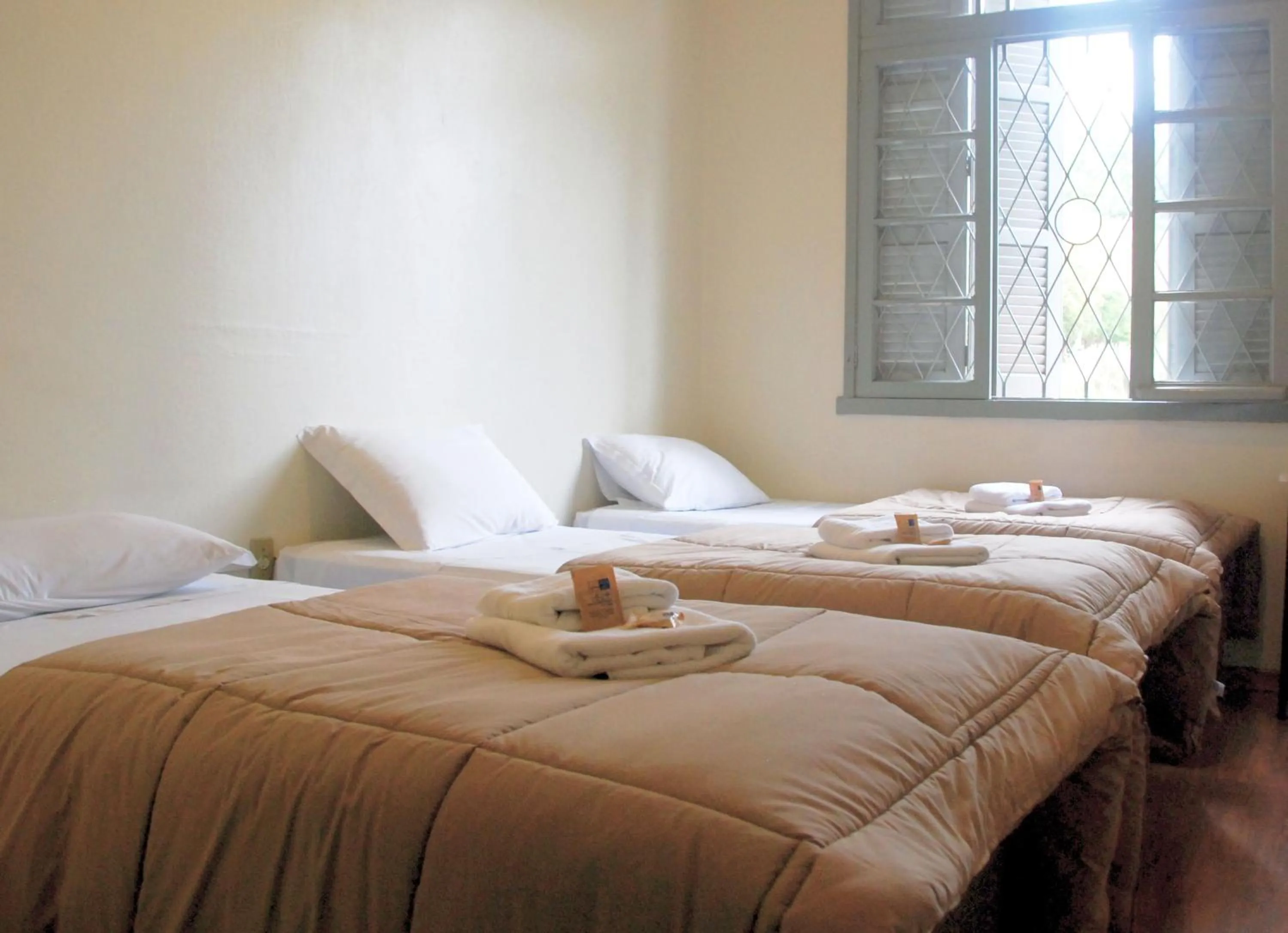 Bed in Hotel Pousada São Lourenço