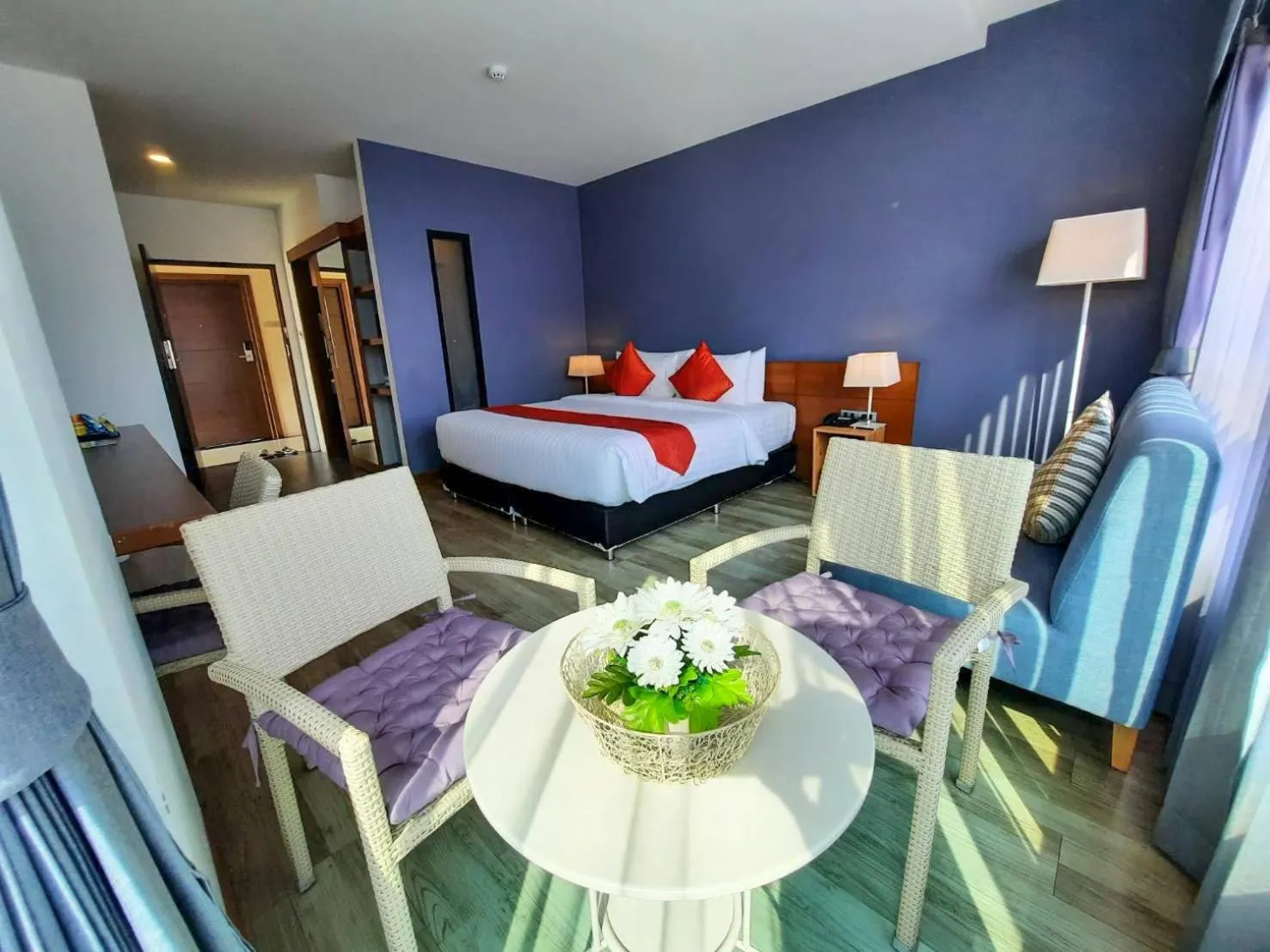 Photo of the whole room, Bed in Comet Hotel Surat Thani