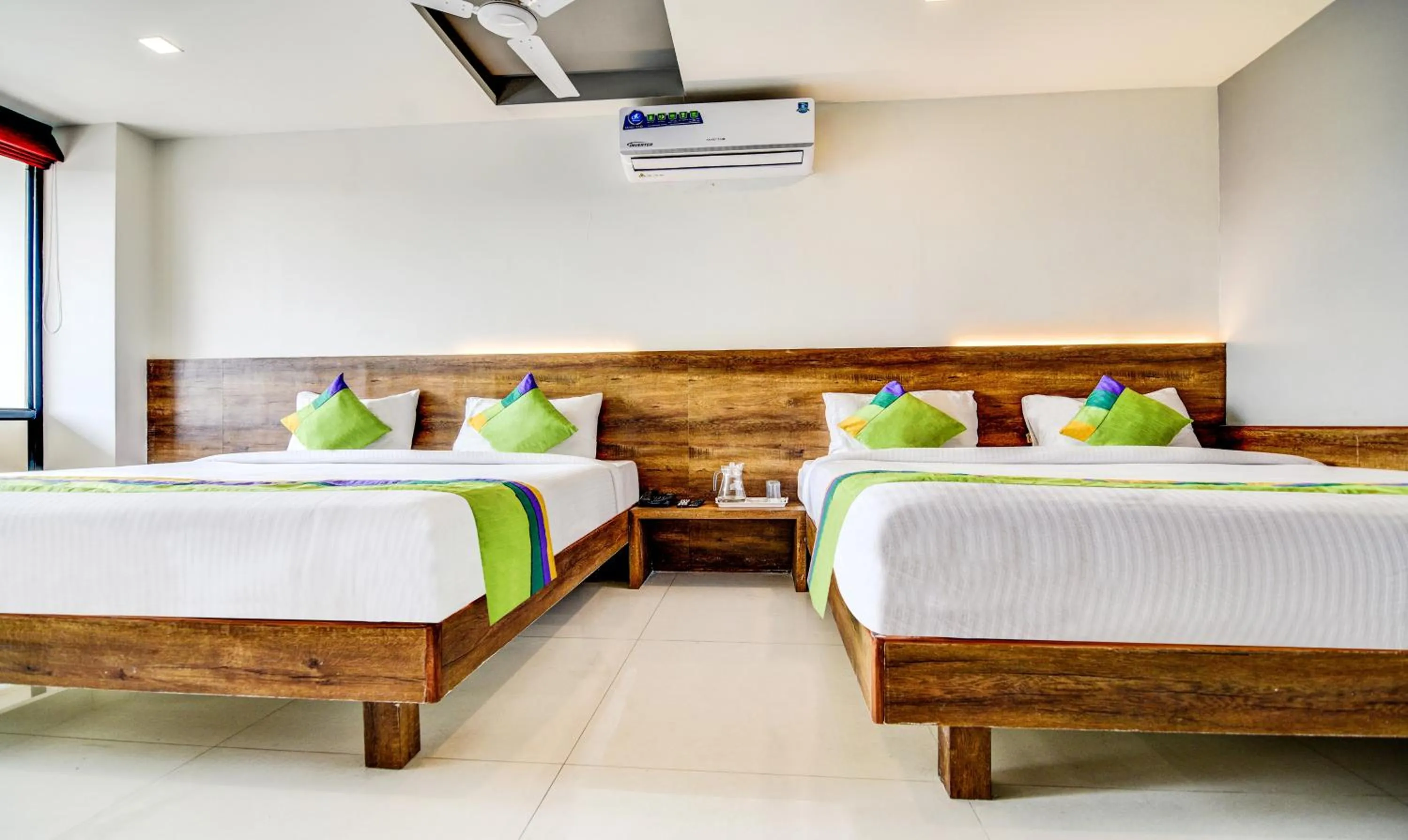 Bedroom, Bed in Treebo Shree Sai Suites - 2km from Mahalaxmi Temple