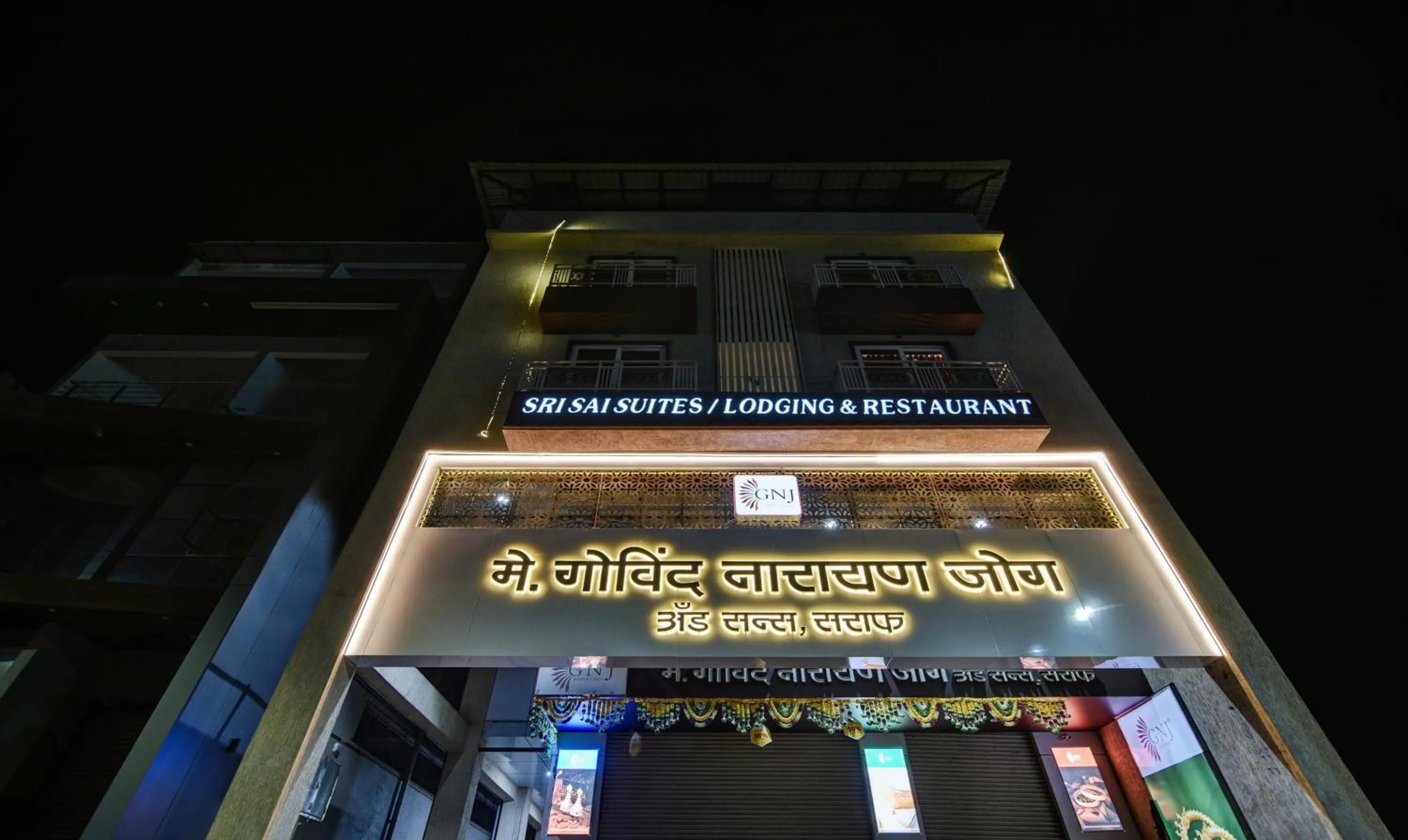 Property building in Treebo Shree Sai Suites - 2km from Mahalaxmi Temple