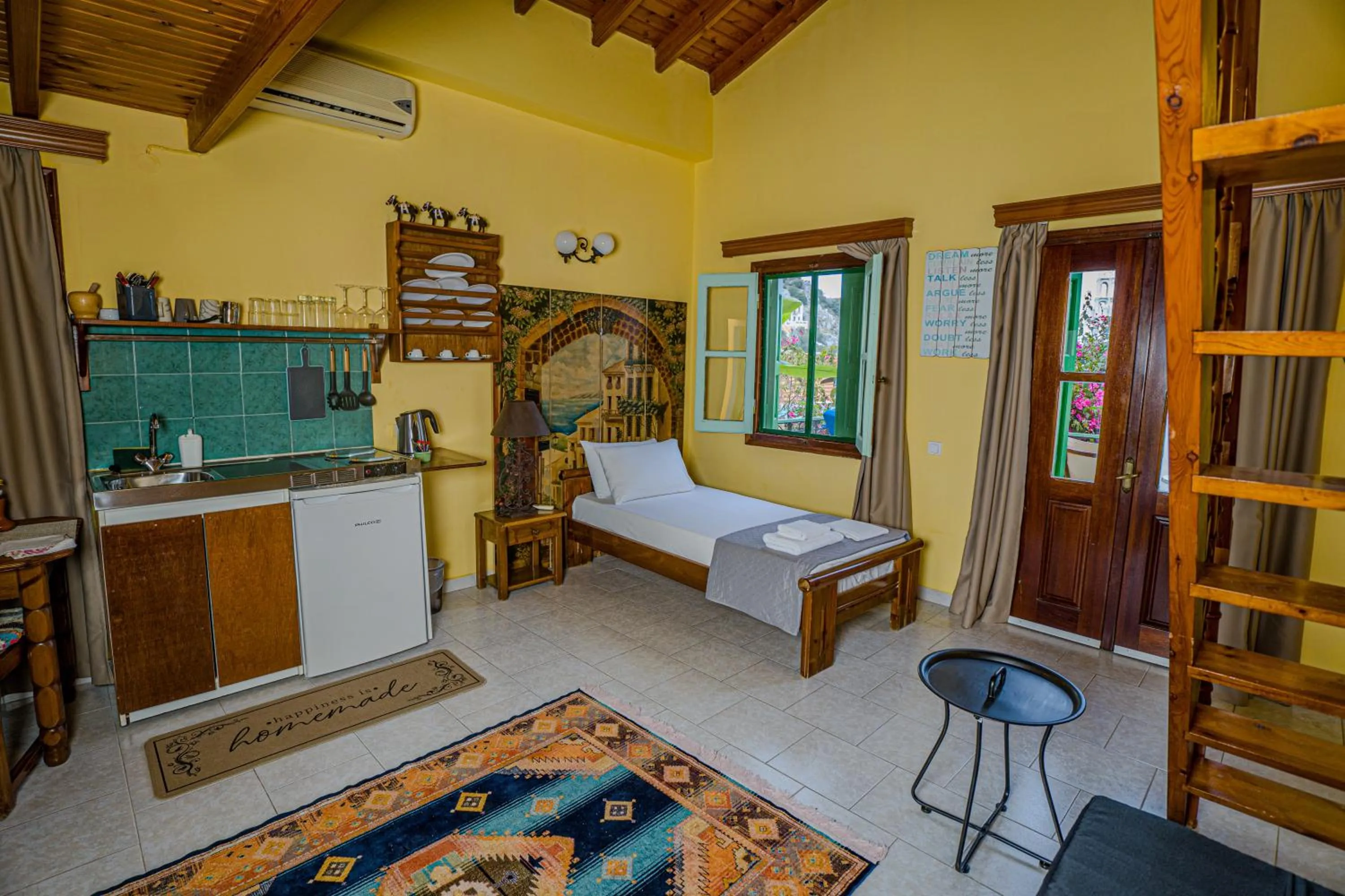 Kitchen or kitchenette in Symi Garden Studios