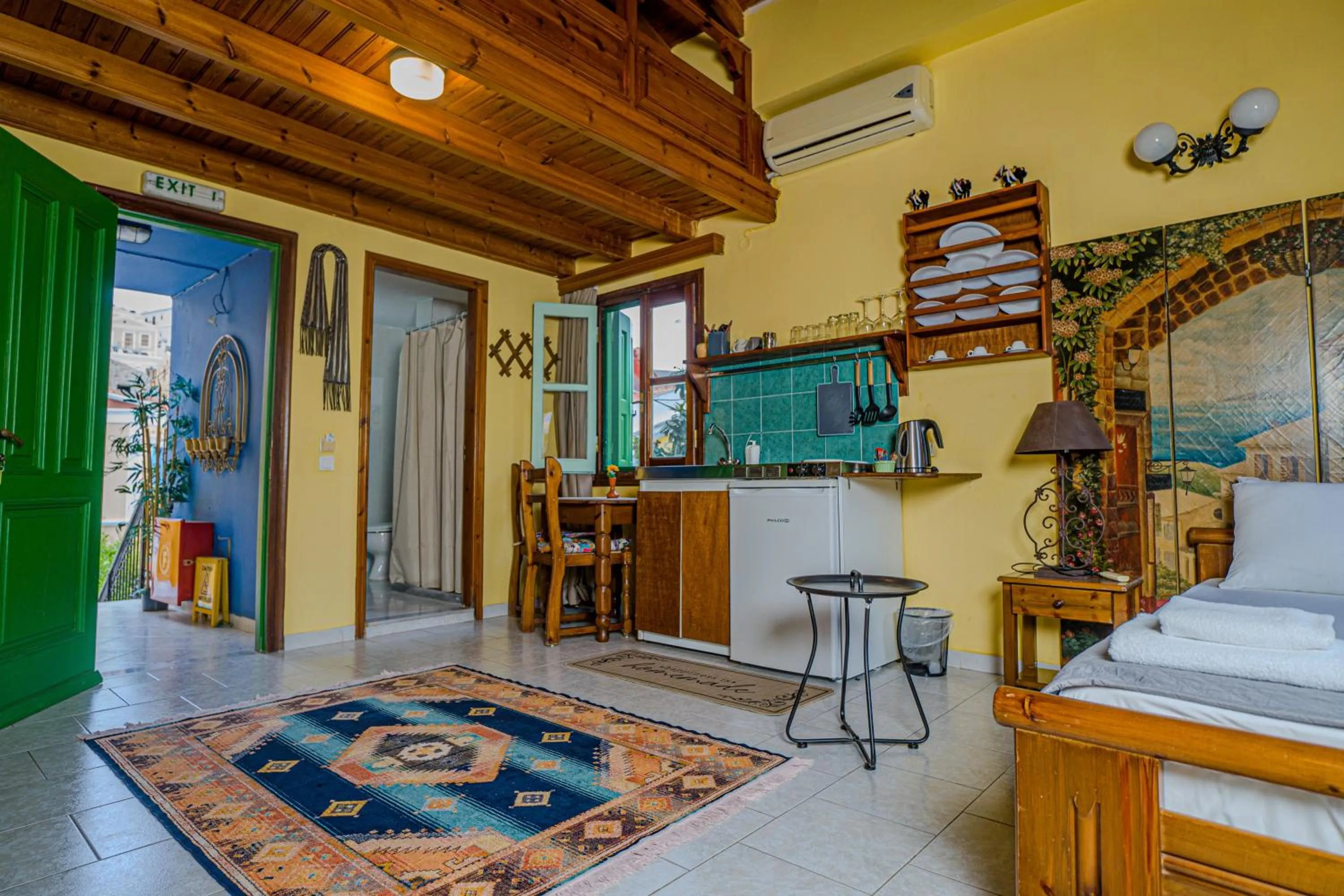 Kitchen or kitchenette in Symi Garden Studios