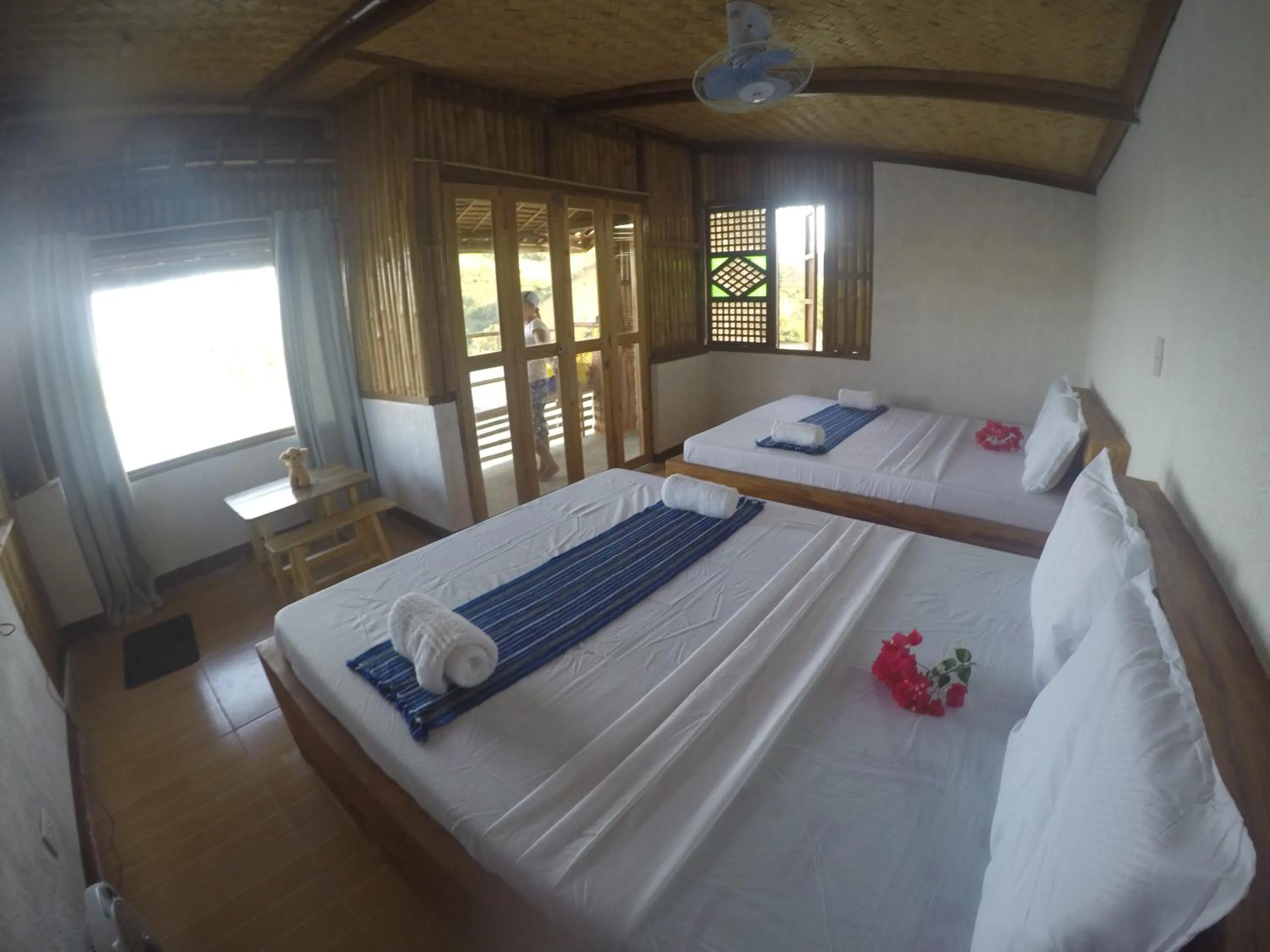 Bed in Borac Bay Bungalows Hotel and Resort