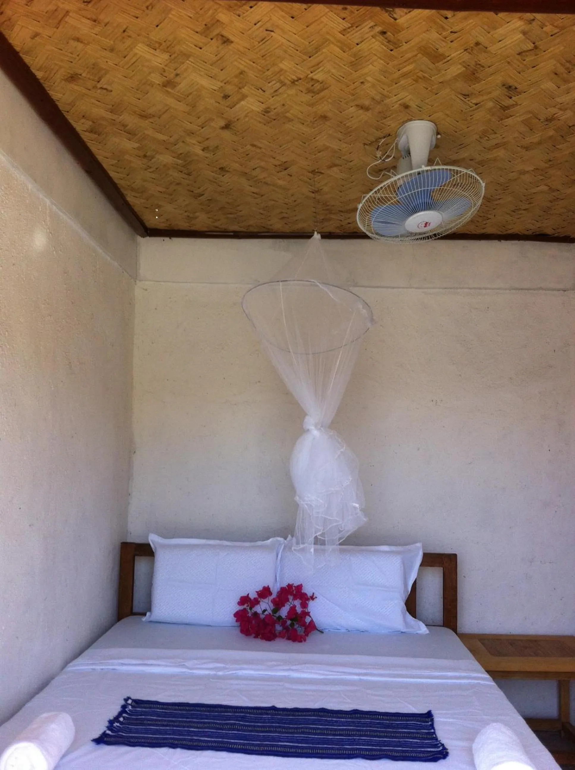 Bed in Borac Bay Bungalows Hotel and Resort
