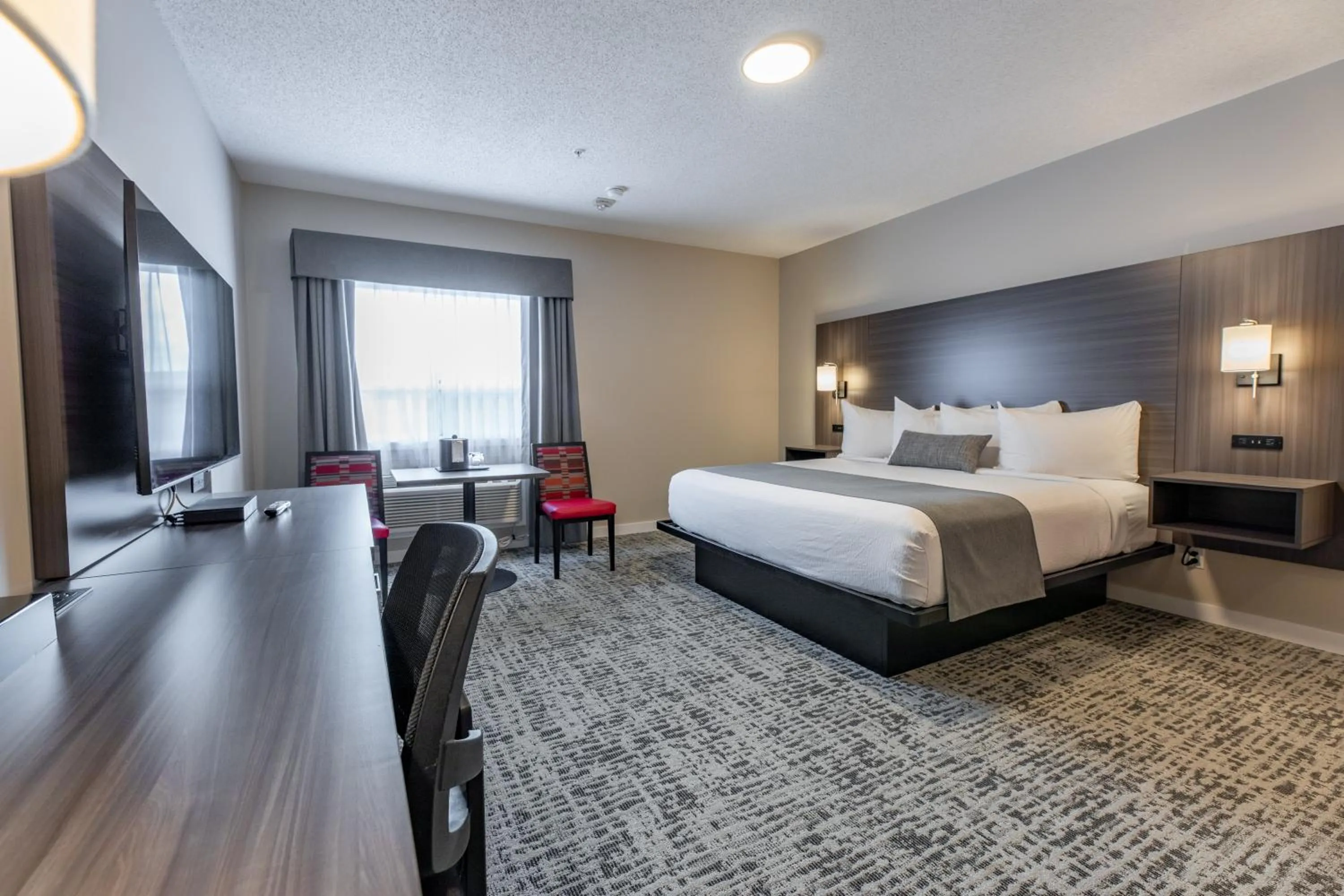 Bed in The Kanata by BCMInns - Hinton