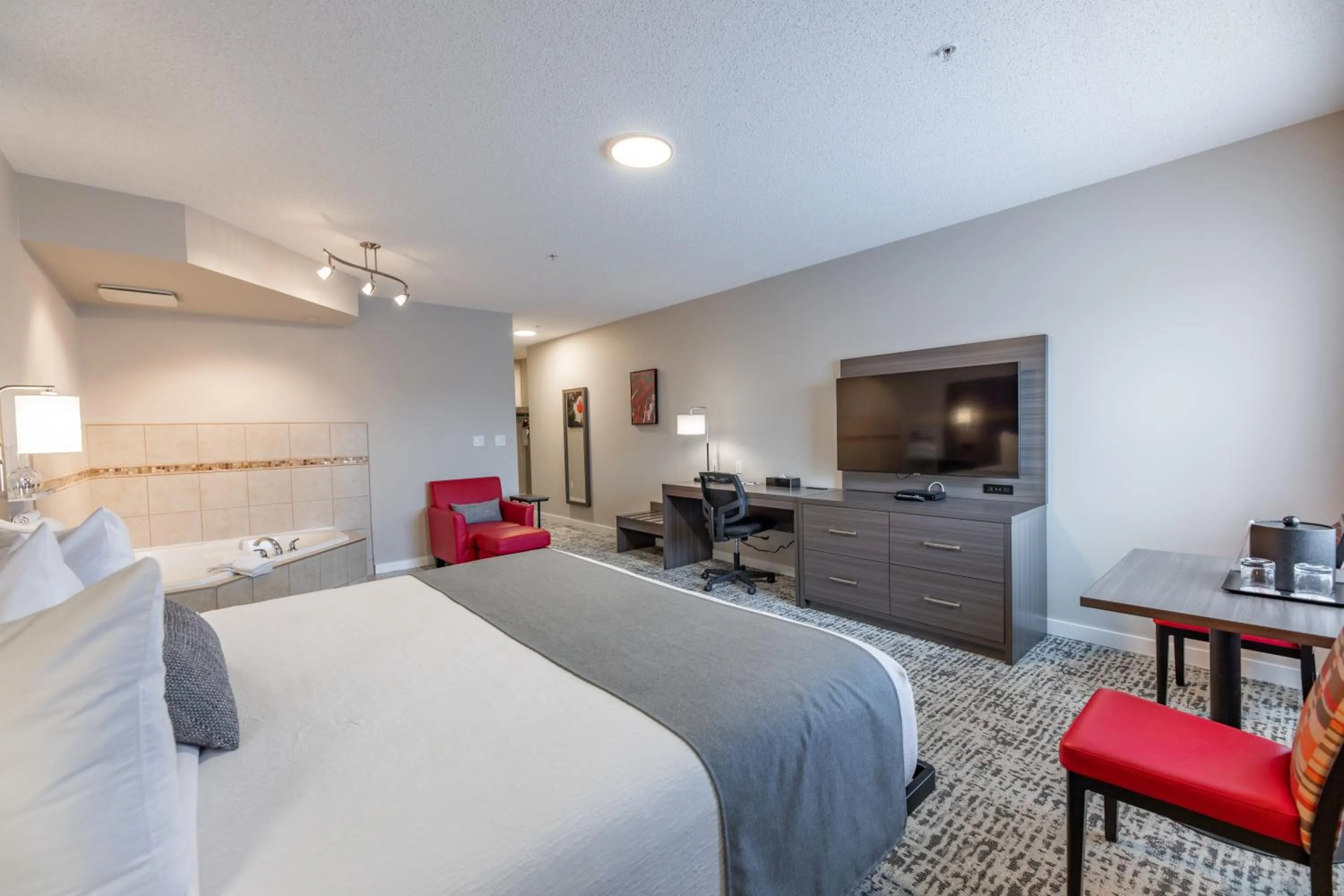 Bed in The Kanata by BCMInns - Hinton