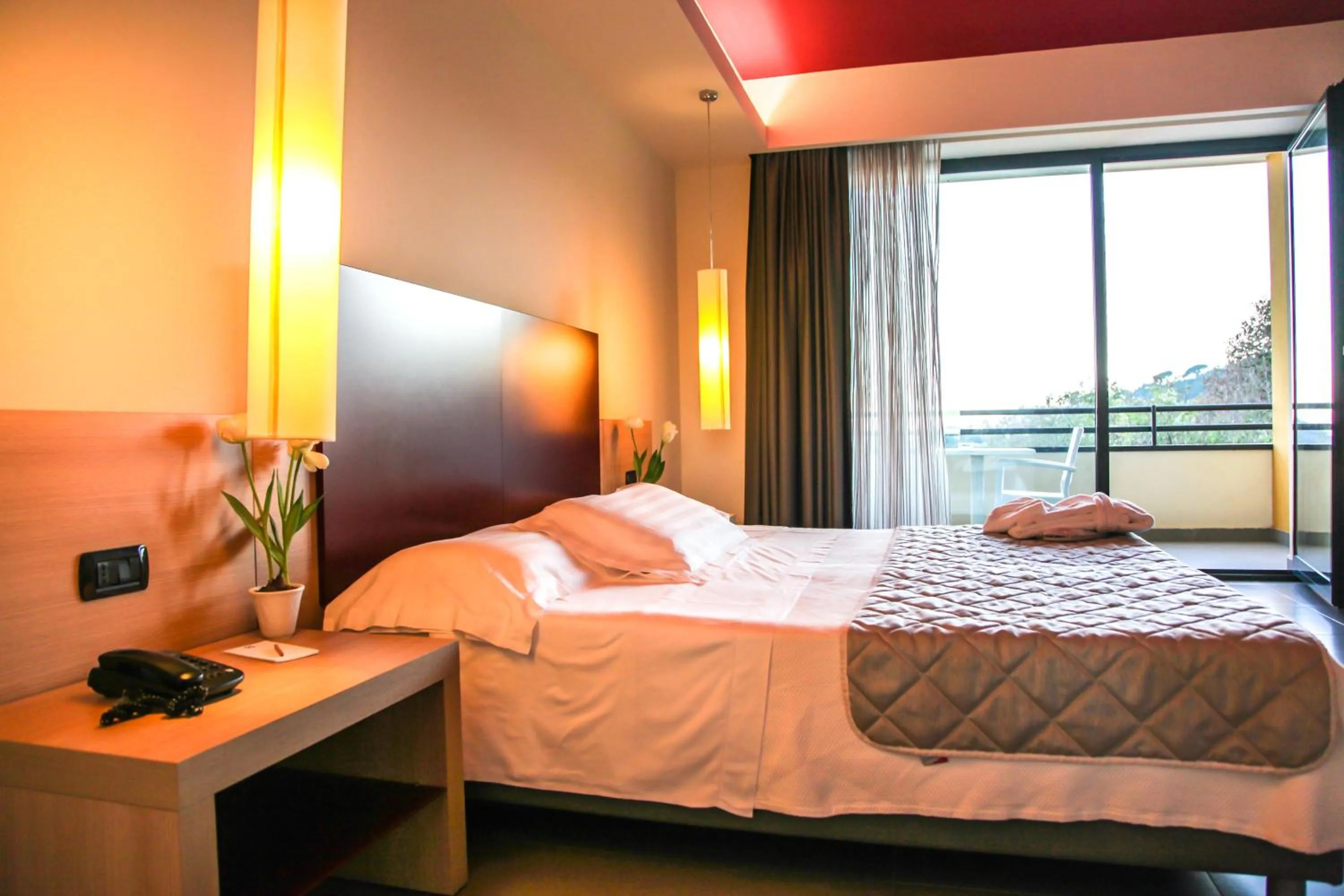 Bed in Esperia Palace Hotel & Resort Spa