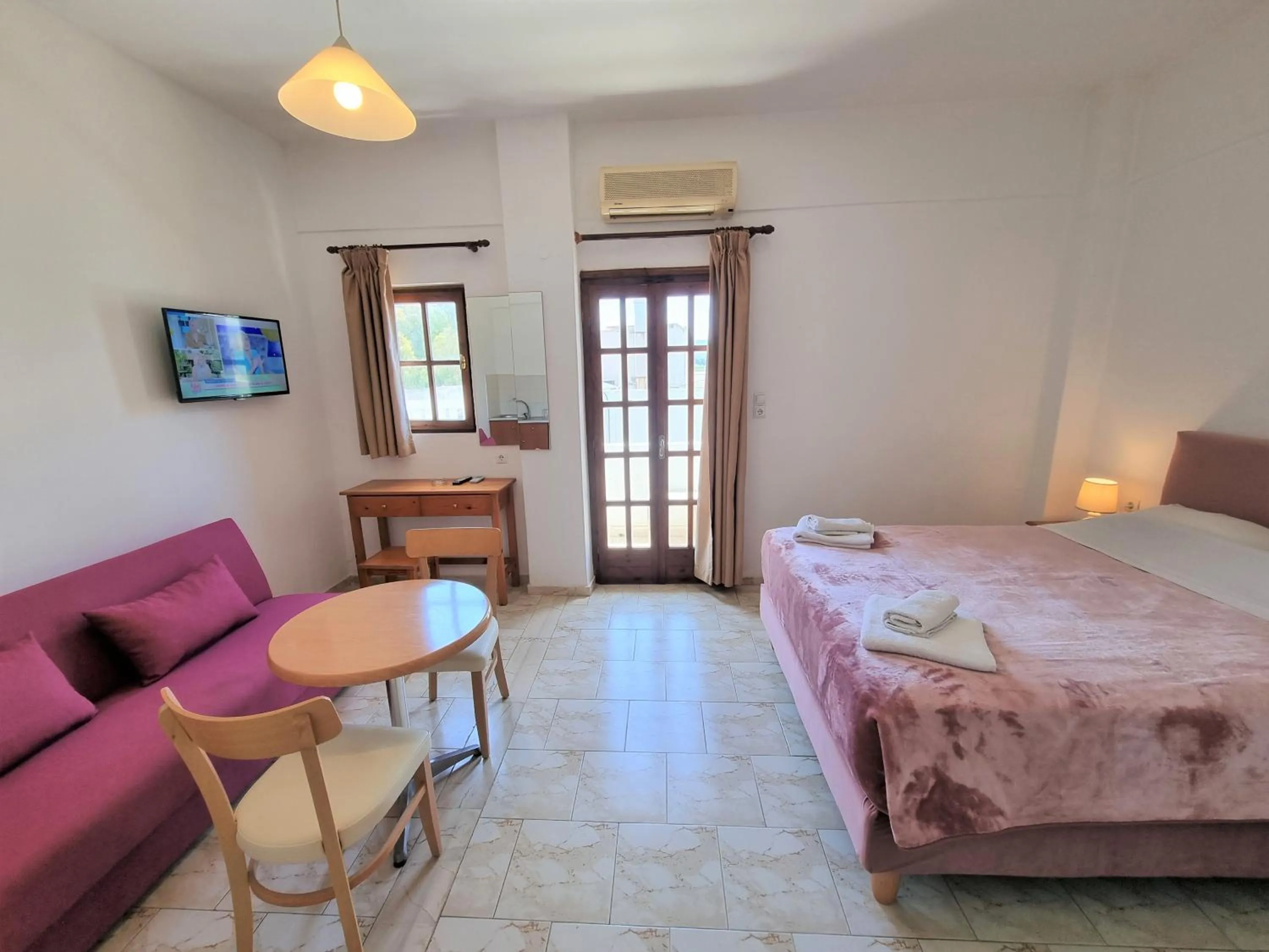 Bed in Arhodiko Hotel