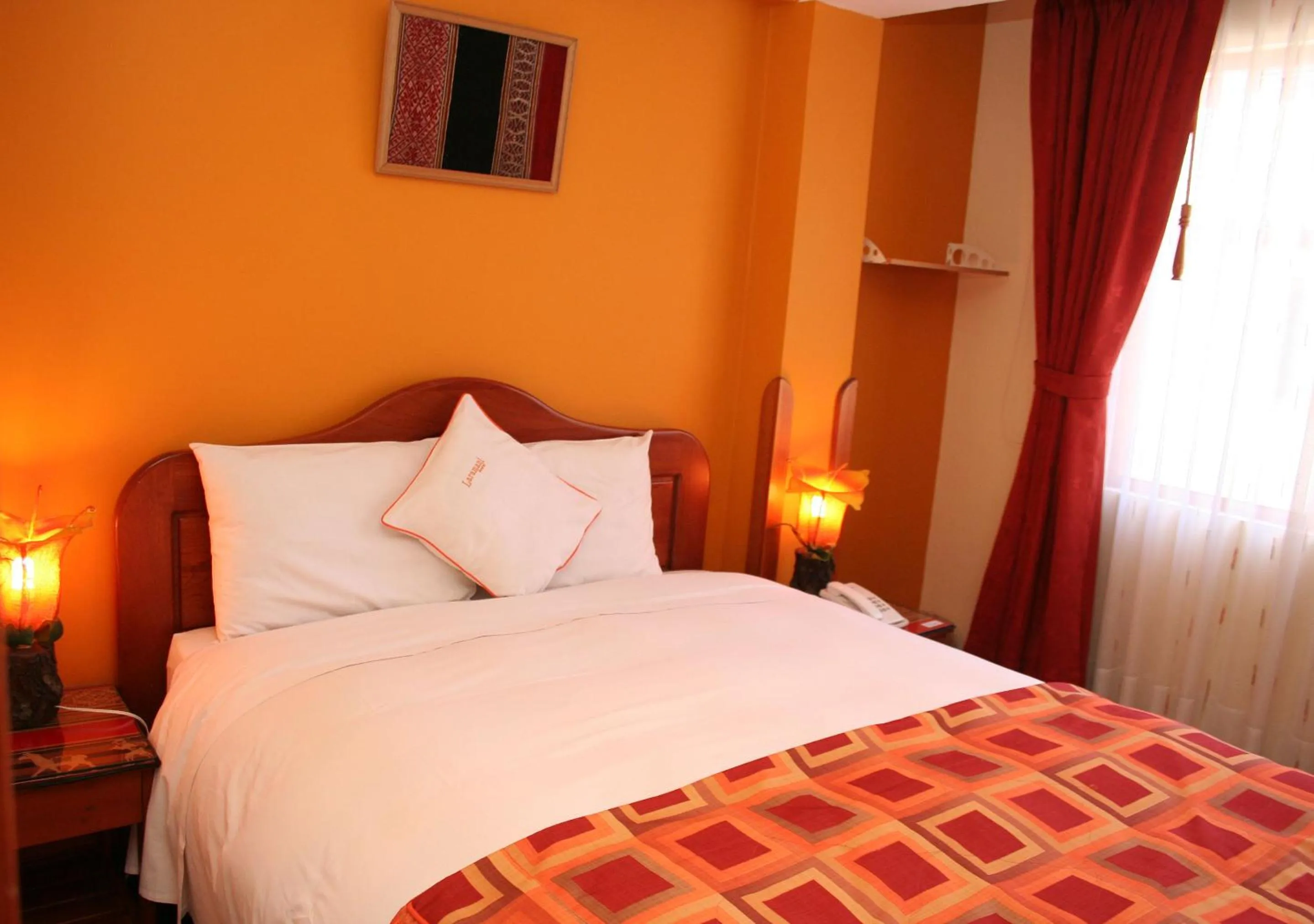 Bed in Laramani Hotel Boutique