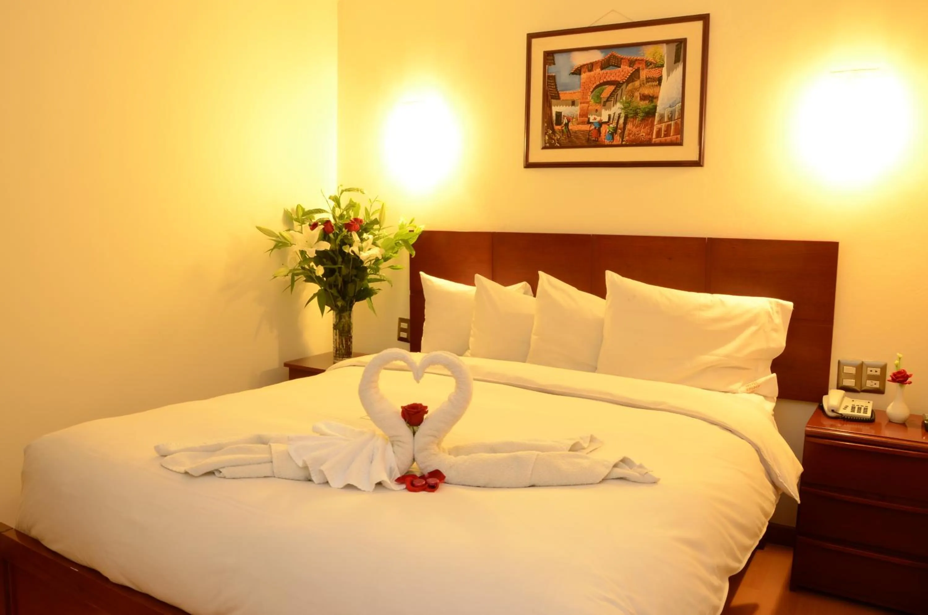 Bed in Golden Inca Hotel