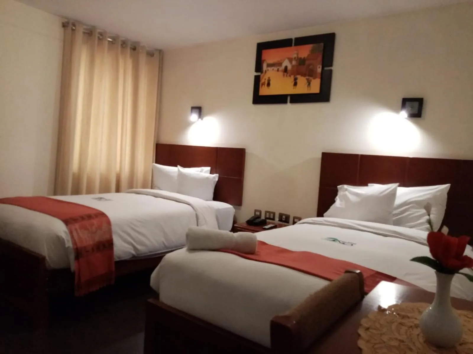 Bed in Golden Inca Hotel