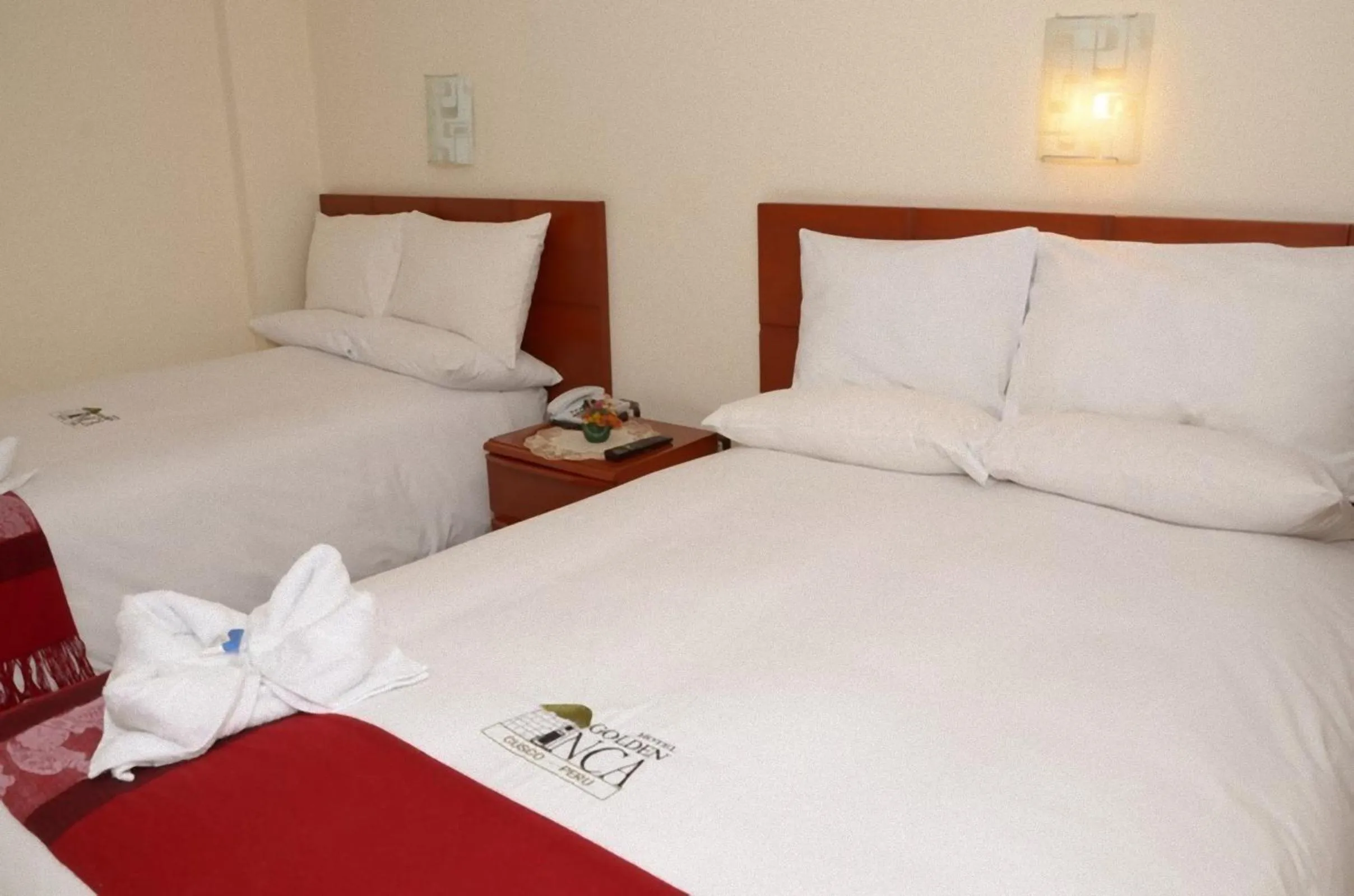 Bed in Golden Inca Hotel