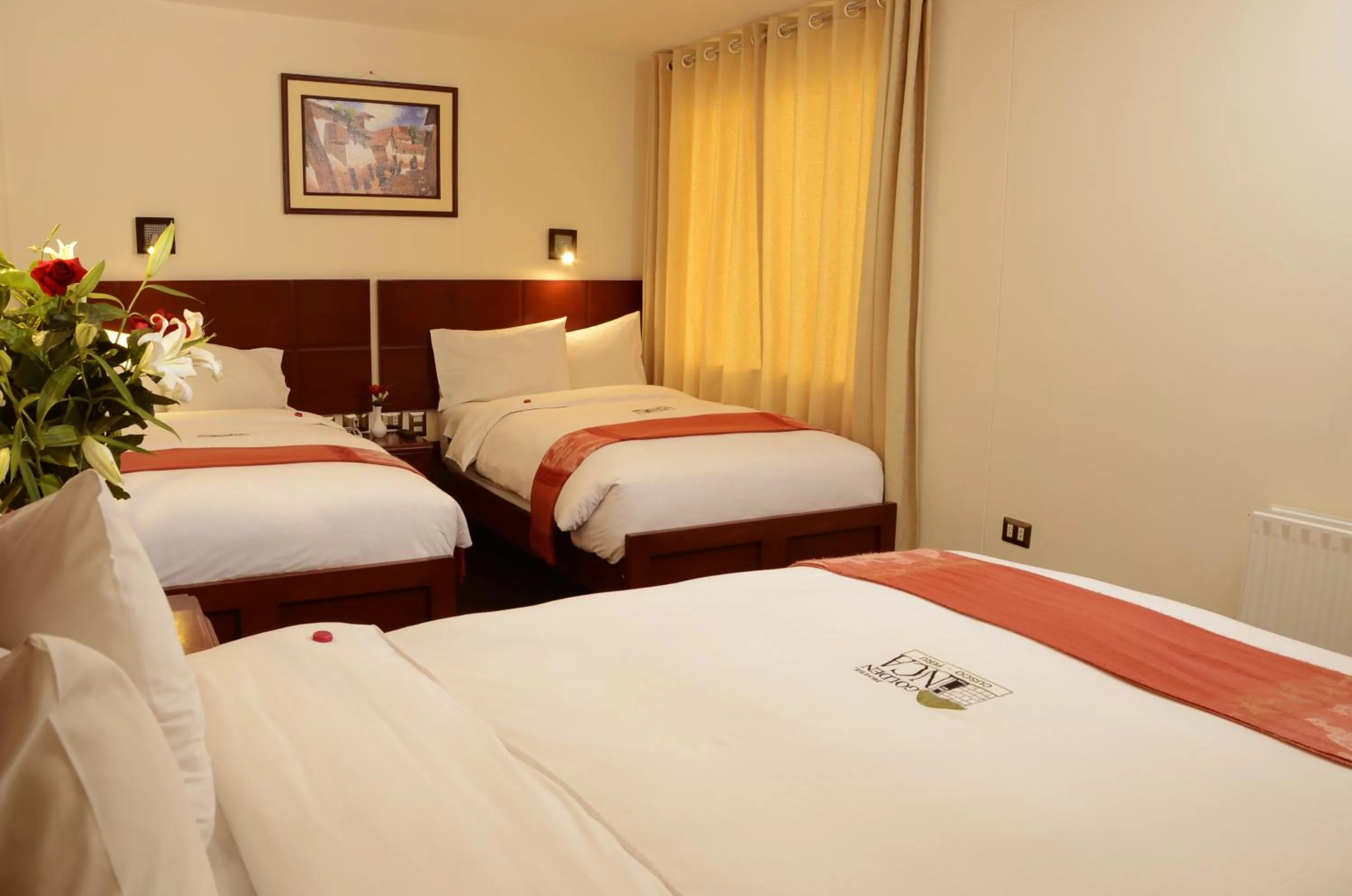 Bedroom, Bed in Golden Inca Hotel