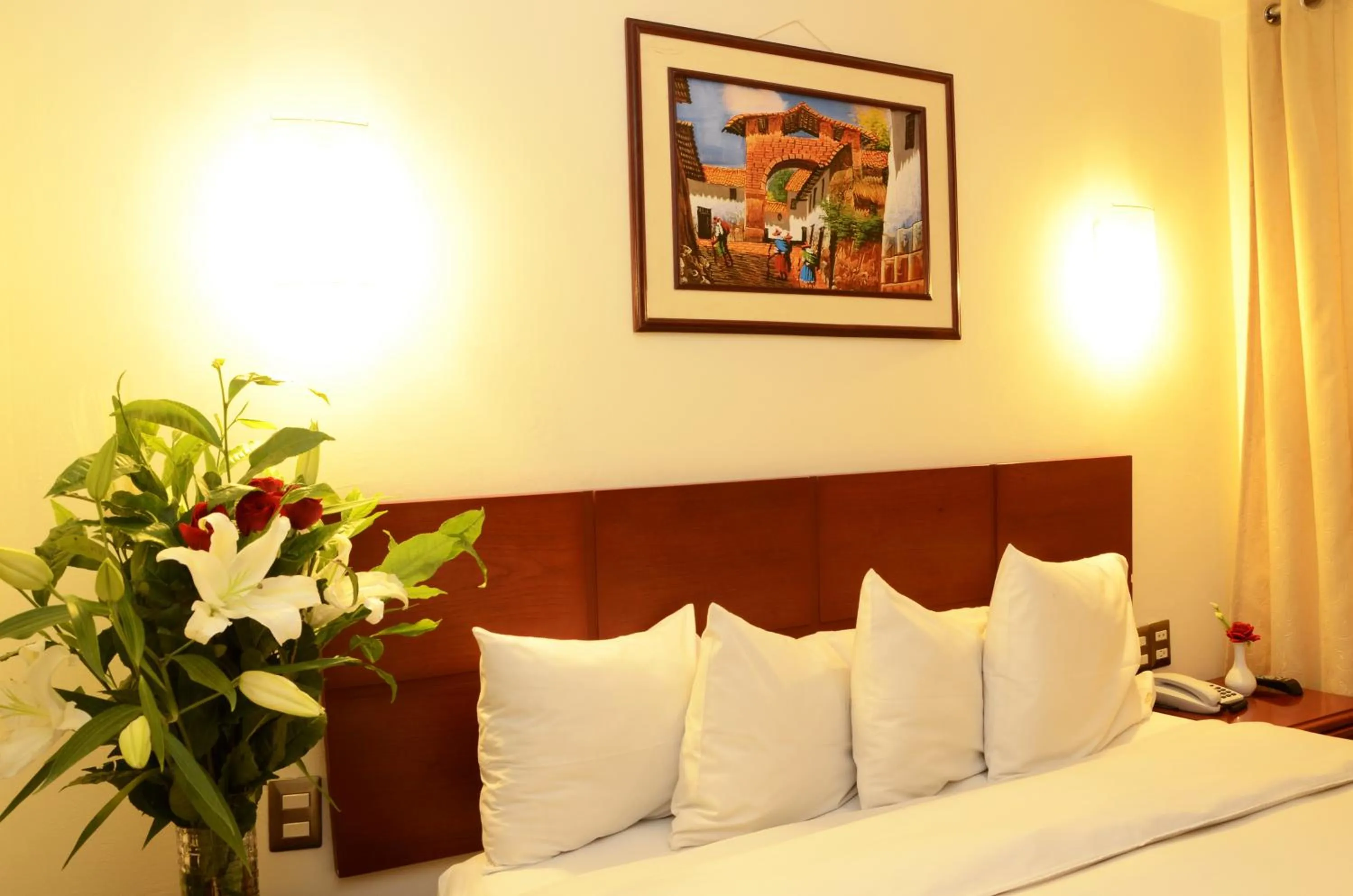 Bed in Golden Inca Hotel