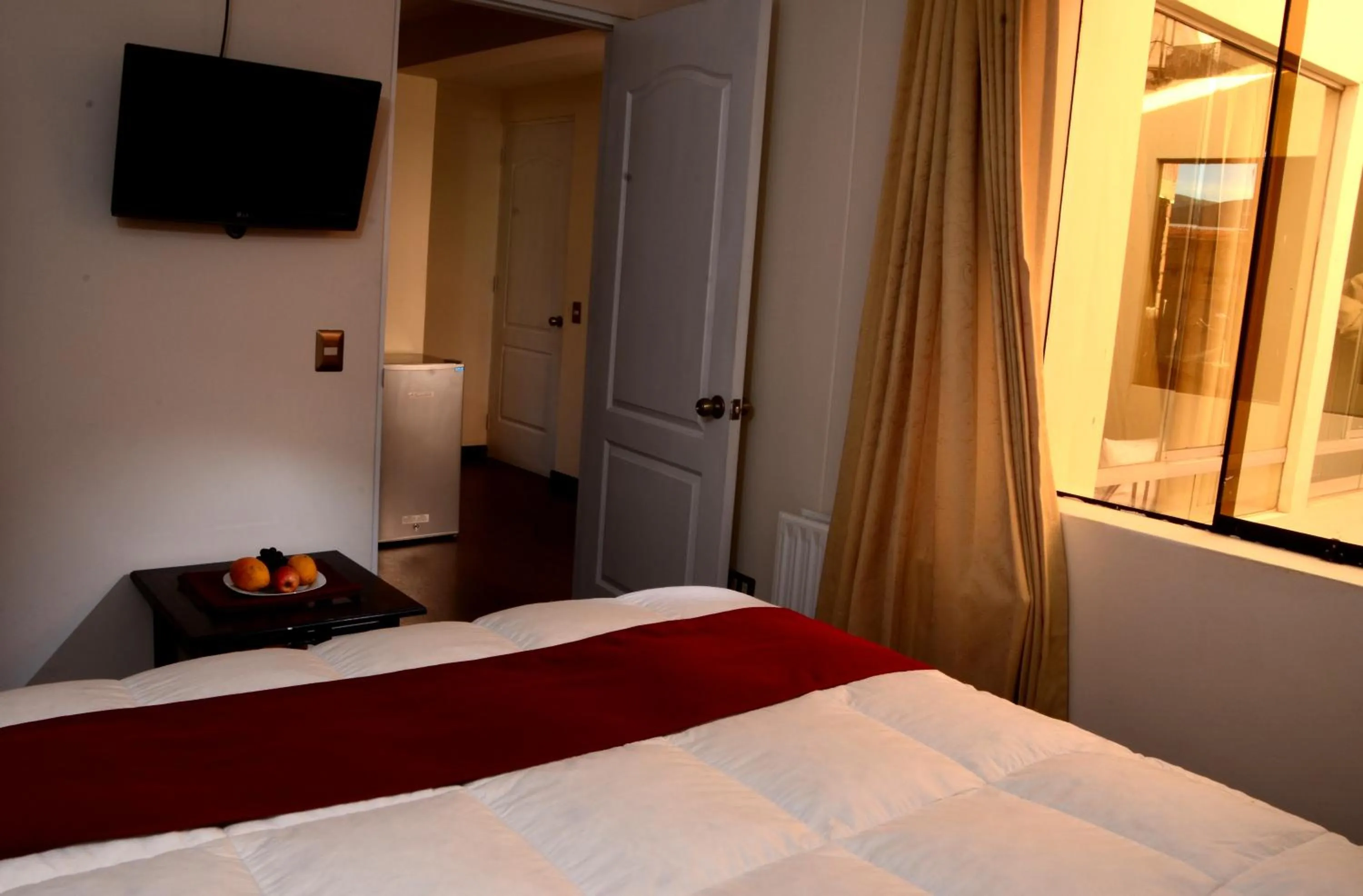 Bedroom, Bed in Golden Inca Hotel