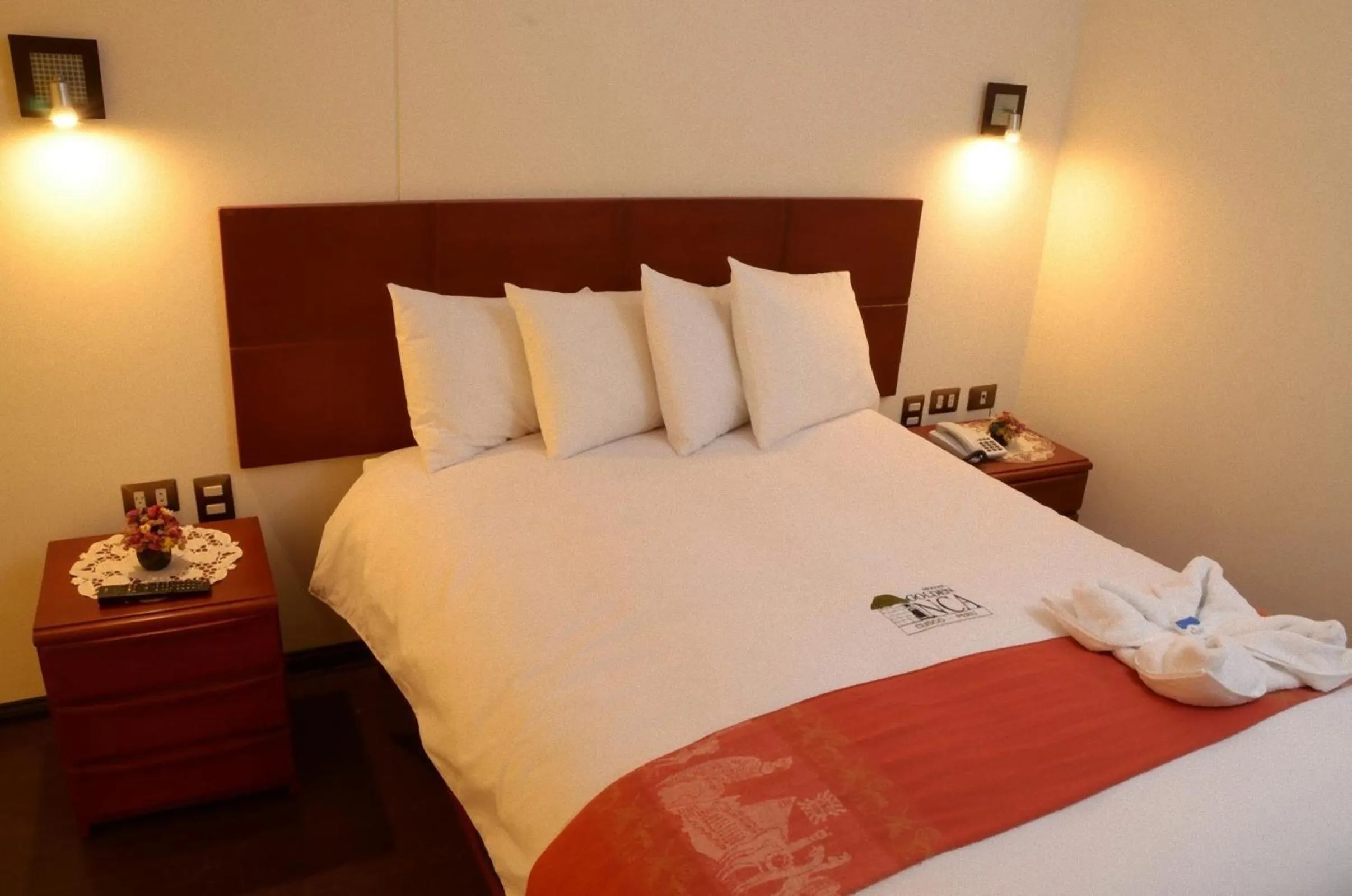 Bed in Golden Inca Hotel