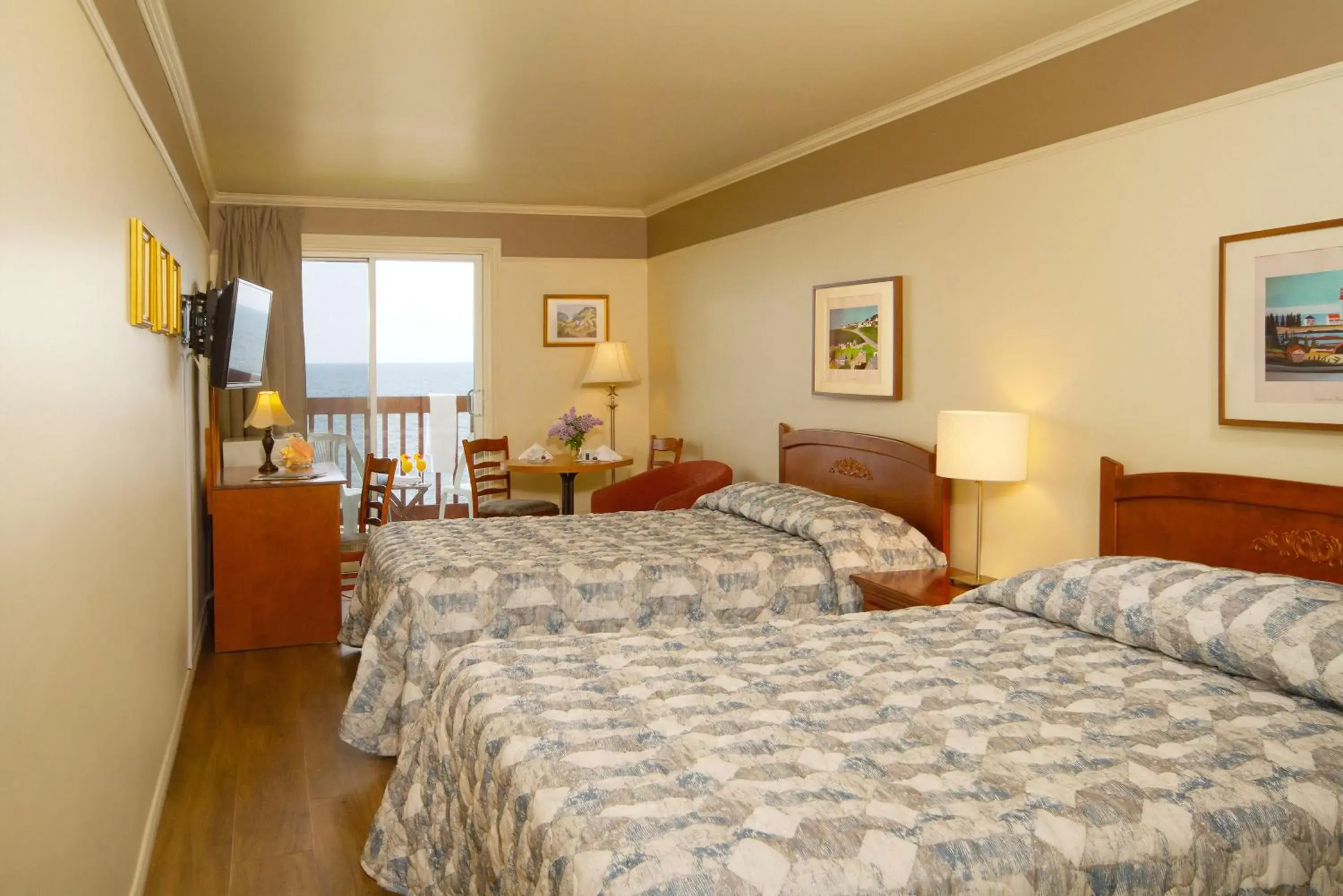 Queen Room with 2 Queen Beds with Sea View - East Pavilion - Second Floor in Hotel Motel Belle Plage Queen Room with 2 Queen Beds with Sea View - East Pavilion - Second Floor in Hotel Motel Belle Plage