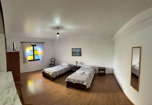 Bed in Pousada da Brigida