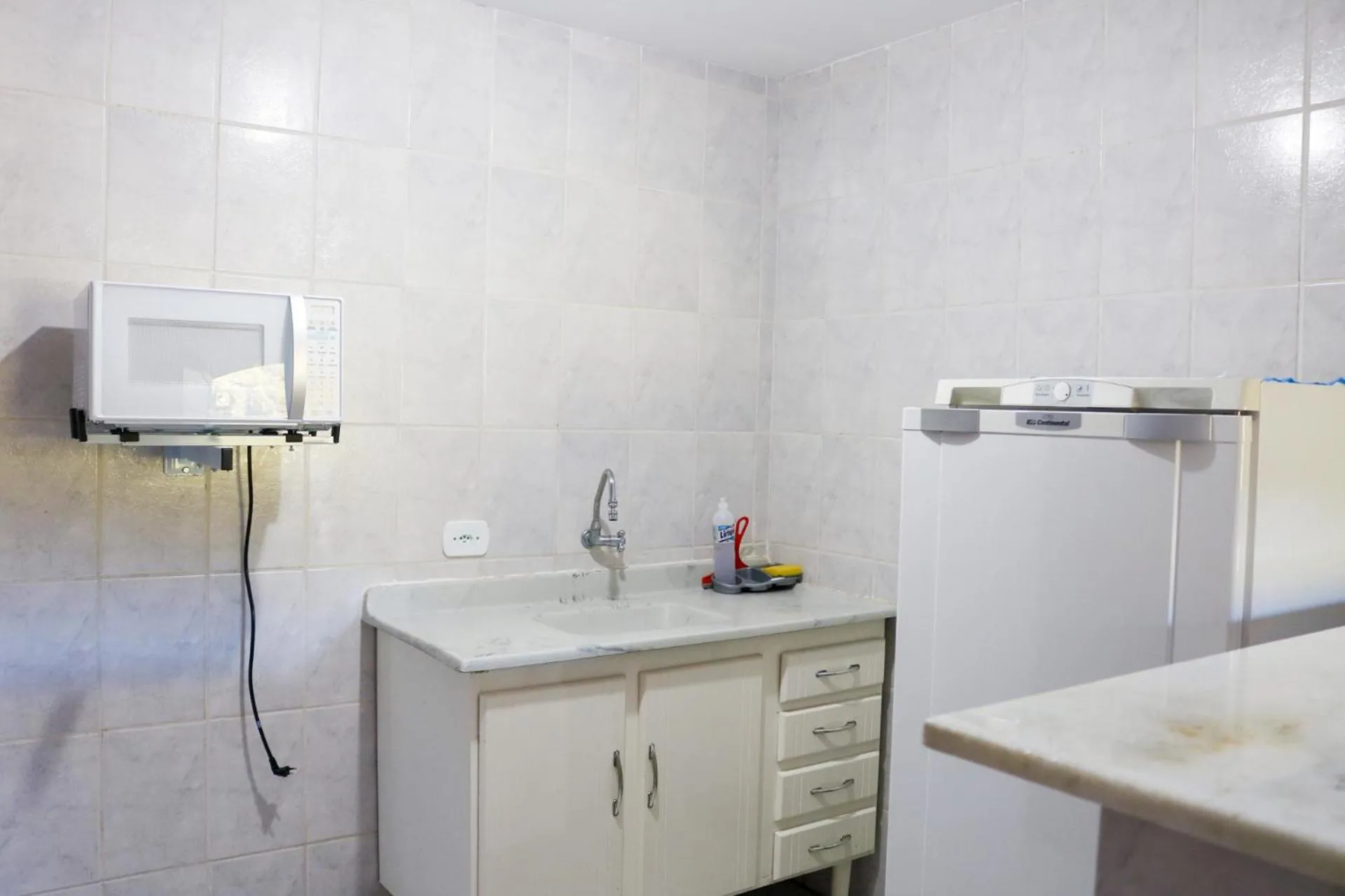Kitchen or kitchenette in Pousada da Brigida