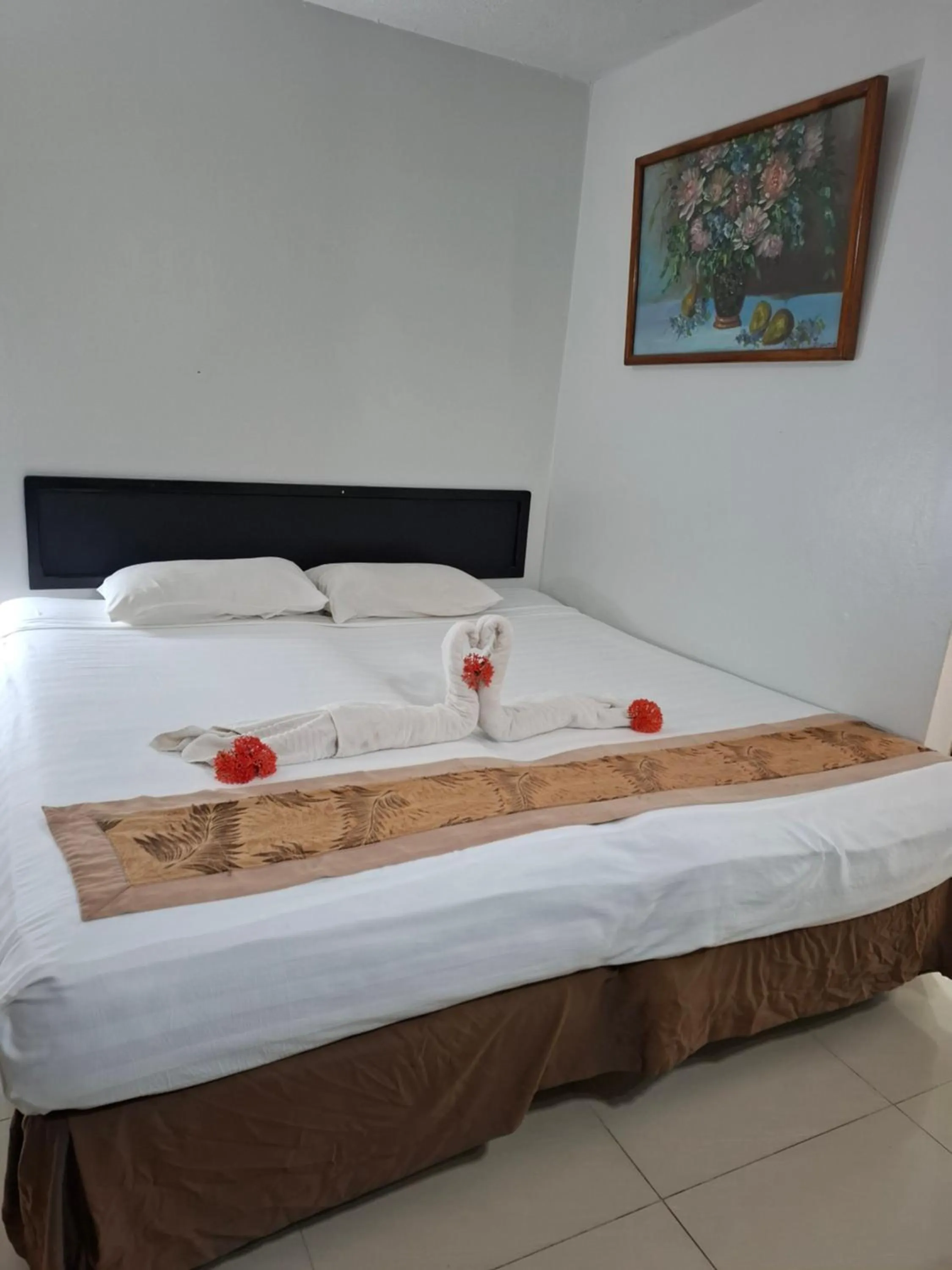 Bed in Capricorn International Hotel