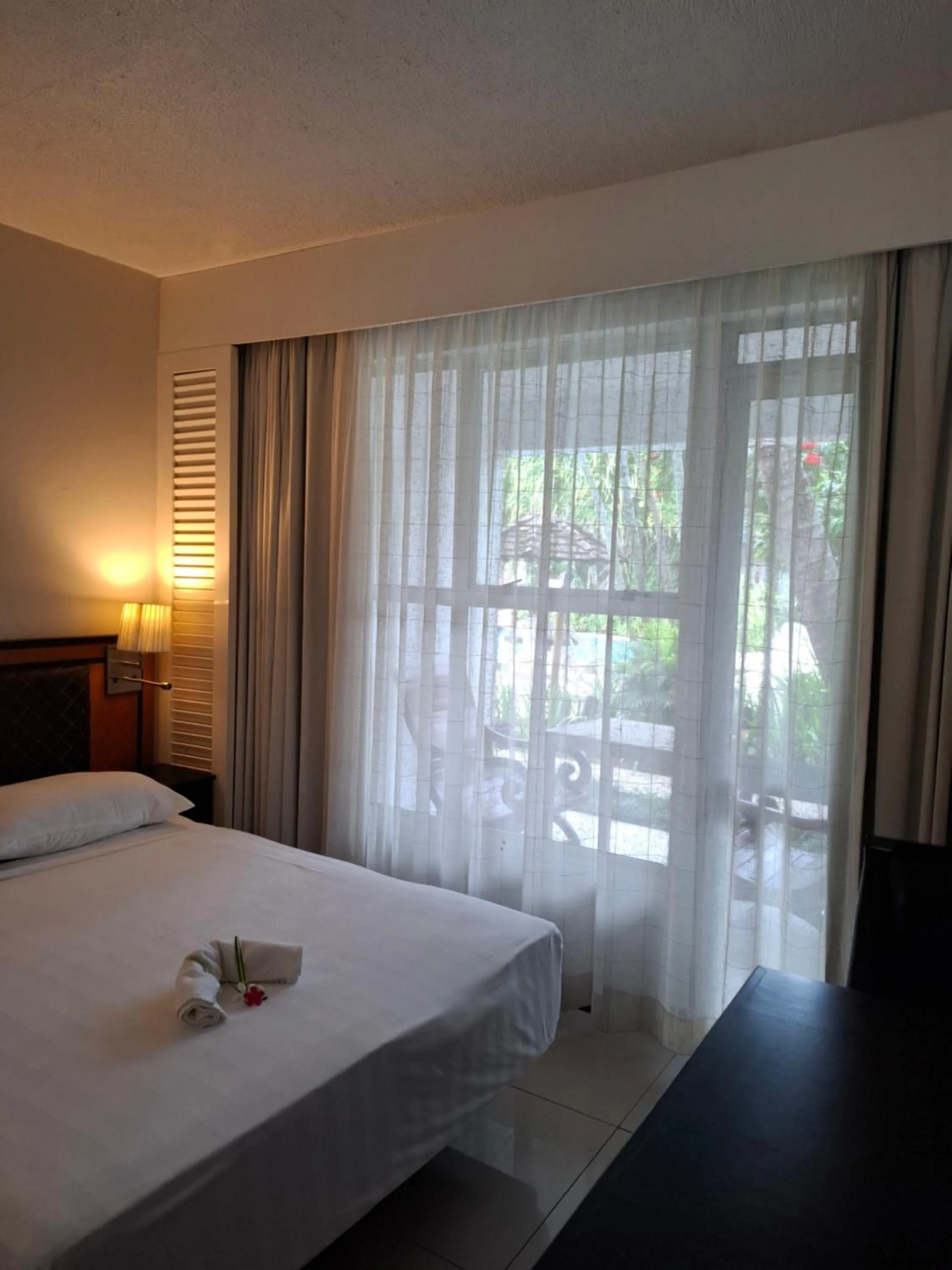 Bed in Capricorn International Hotel