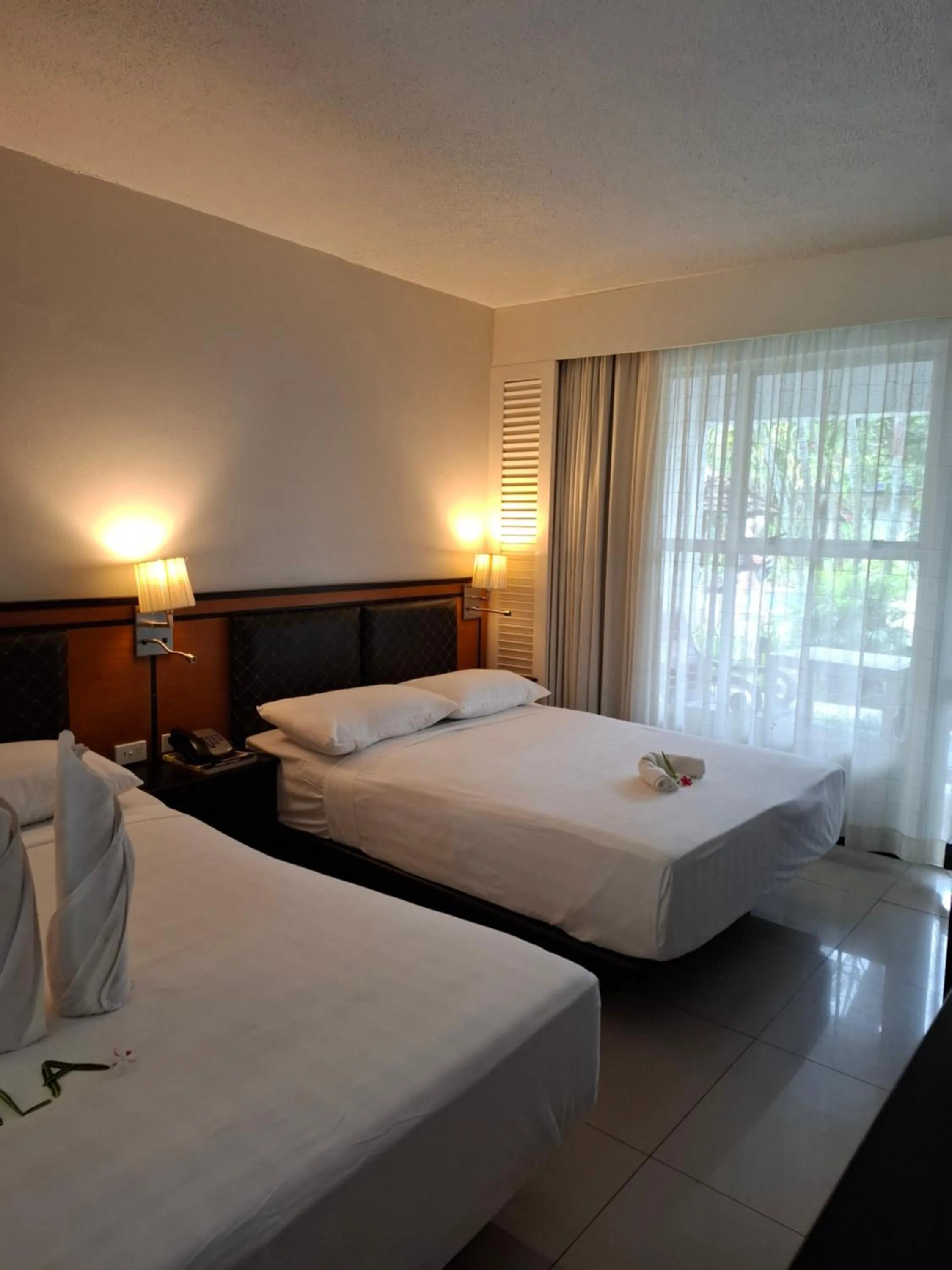 Bed in Capricorn International Hotel