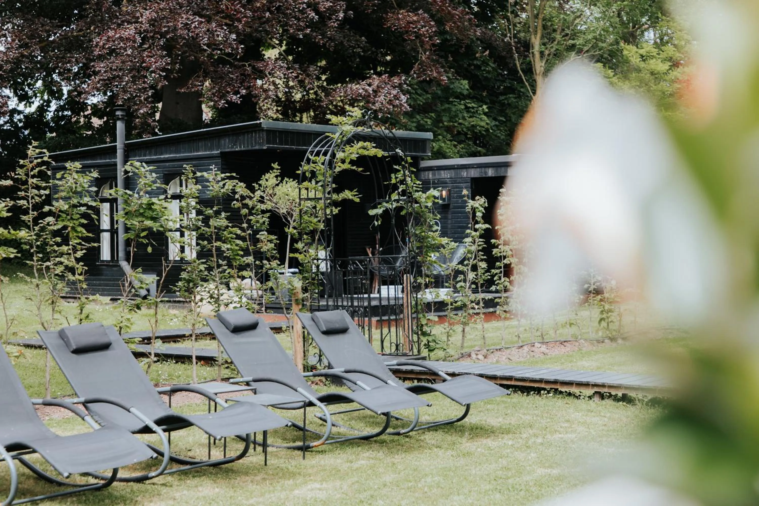 Garden in Charmehotel Manoir Ogygia