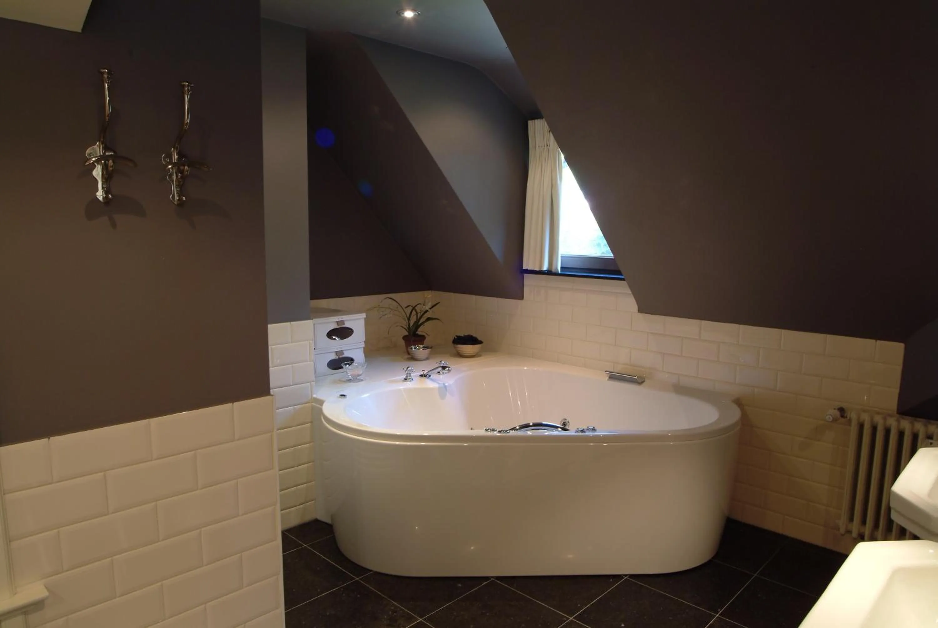 Bathroom in Charmehotel Manoir Ogygia