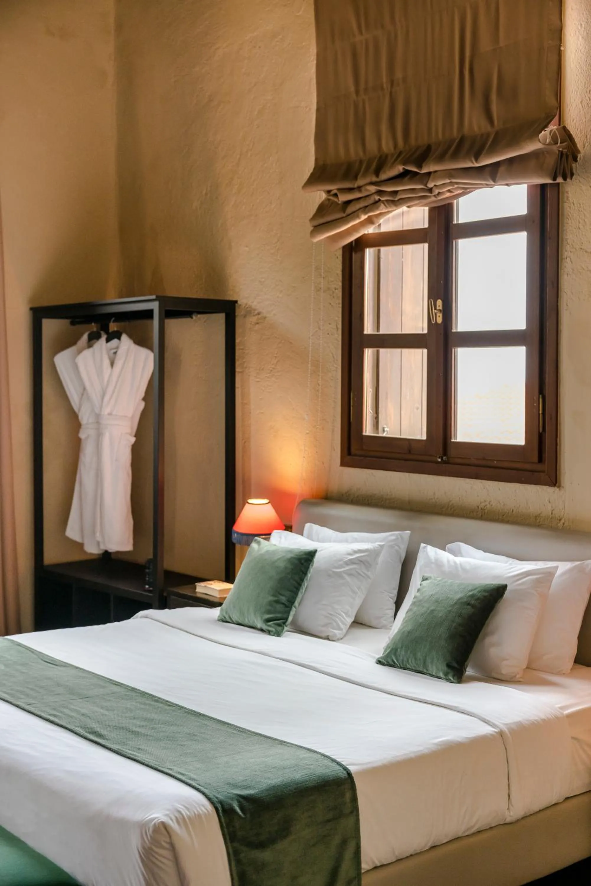 Bed in Alcanea Boutique Hotel